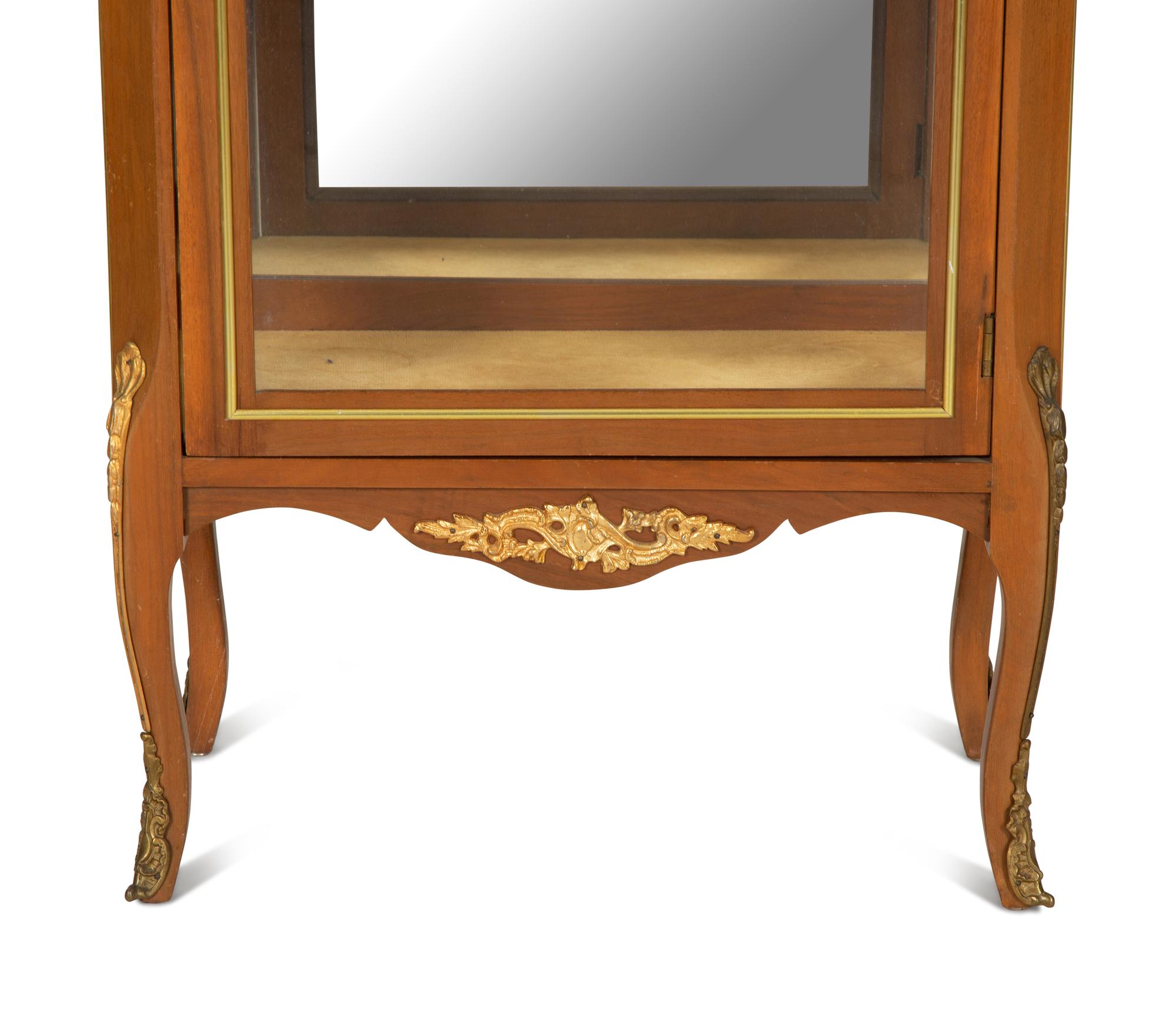 A Louis XV/XVI Transitional Style Gilt-Metal Mounted Mahogany Marble-Top Vitrine Cabinet