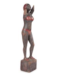 A Carved and Painted Wood Bather Figure