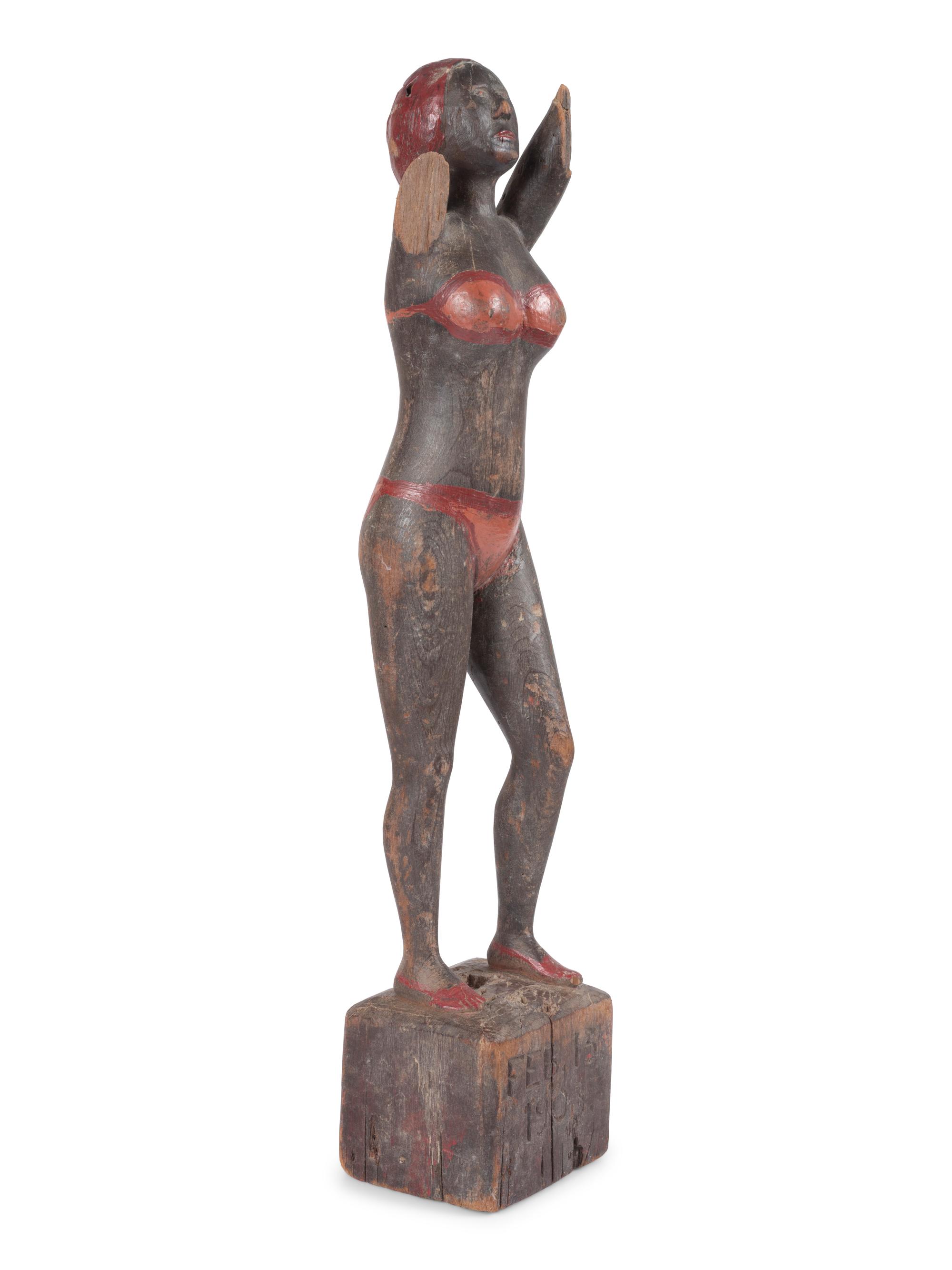 A Carved and Painted Wood Bather Figure