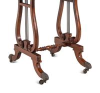 A Regency Style Figured Mahogany Two-Drawer Lyre-Base Work Table