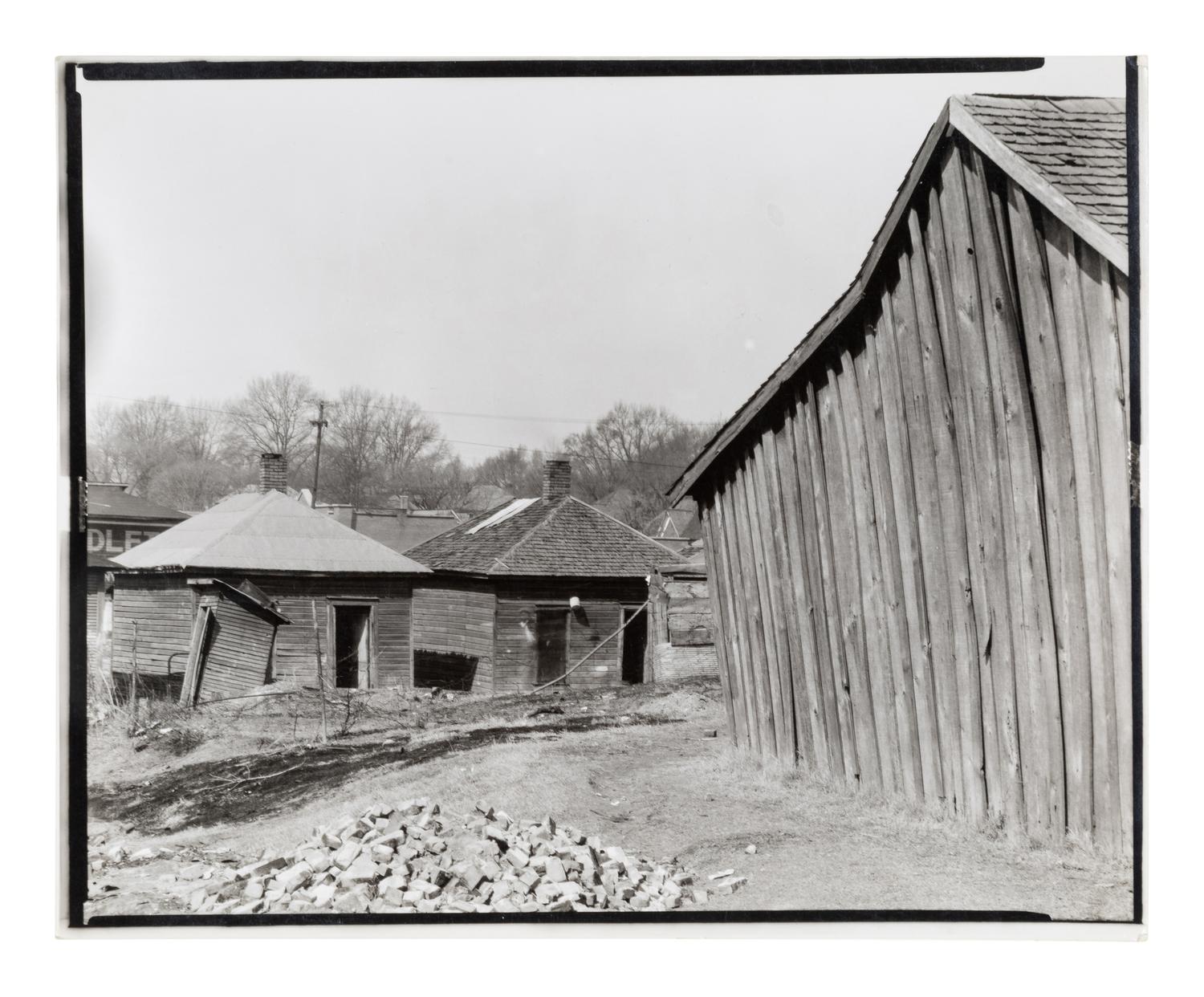 Walker Evans (1903-1975) Scott's Rim Mining Camp, near Morgantown, West Virginia; Untitled (Miners' huts;) and Company Houses for Miners, Masontown, Near Preston County, West Virginia, 1935