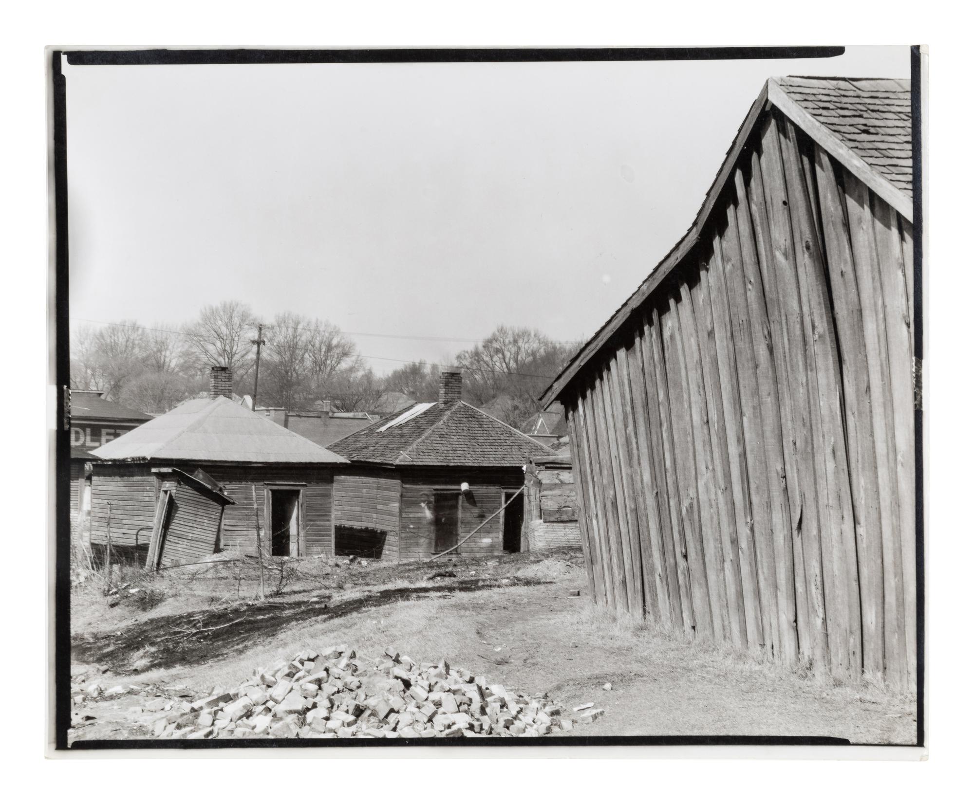 Walker Evans (1903-1975) Scott's Rim Mining Camp, near Morgantown, West Virginia; Untitled (Miners' huts;) and Company Houses for Miners, Masontown, Near Preston County, West Virginia, 1935