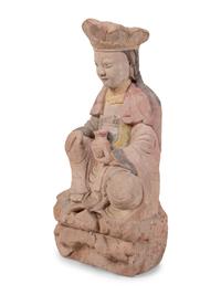 A Chinese Carved Stone Seated Figure with Polychrome Decoration