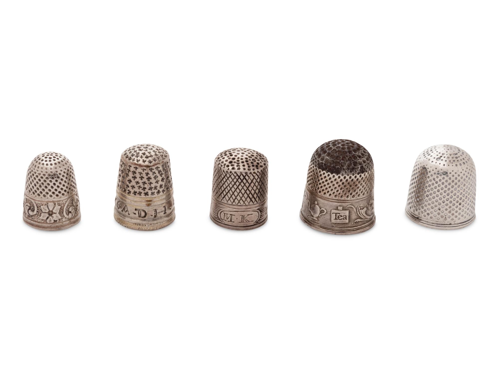 A Group of Five Silver Children's Thimbles
