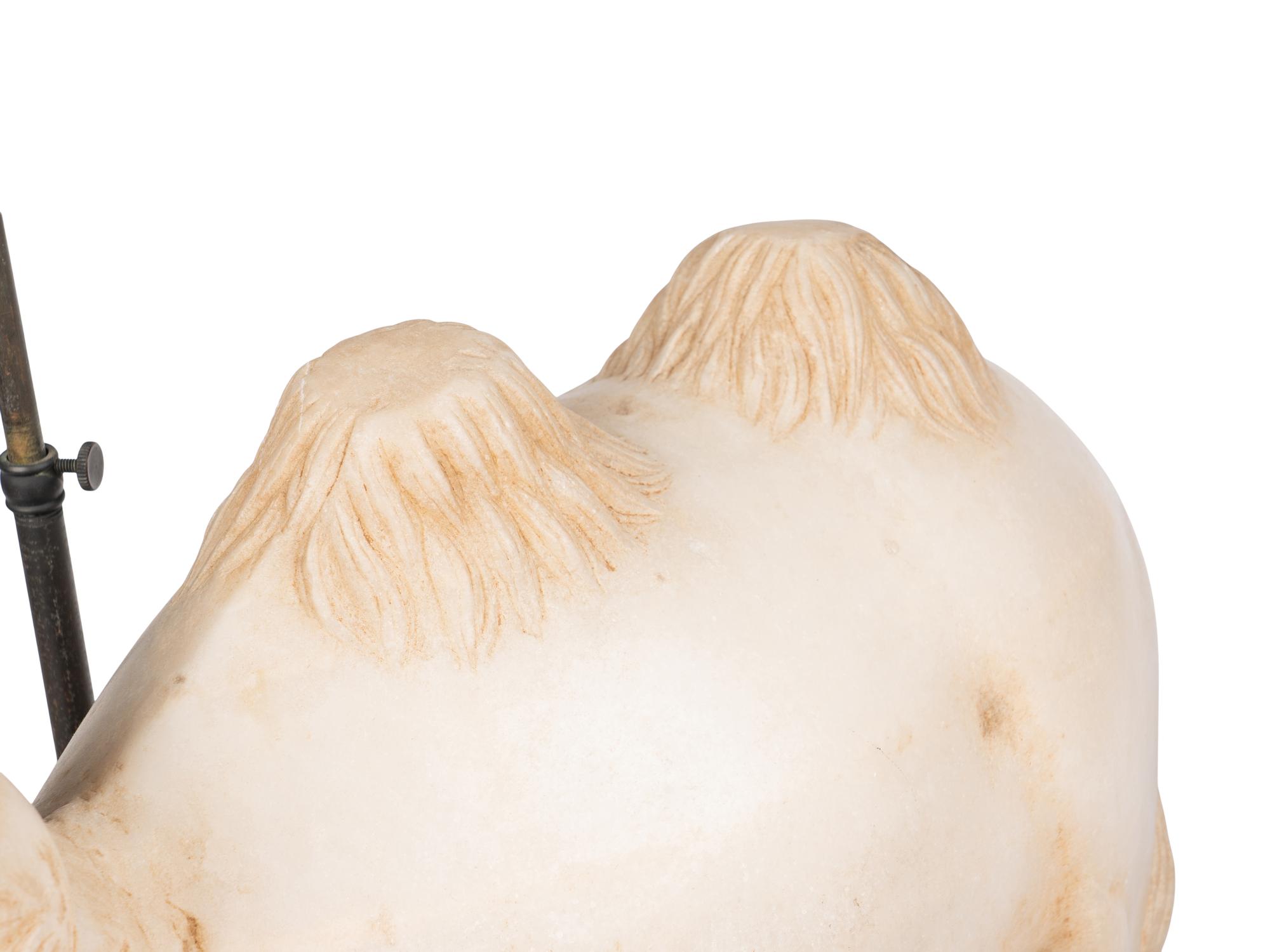 A Pair of Carved Marble Camels