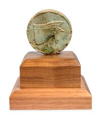 An Egyptian Faience Two-Sided Medallion