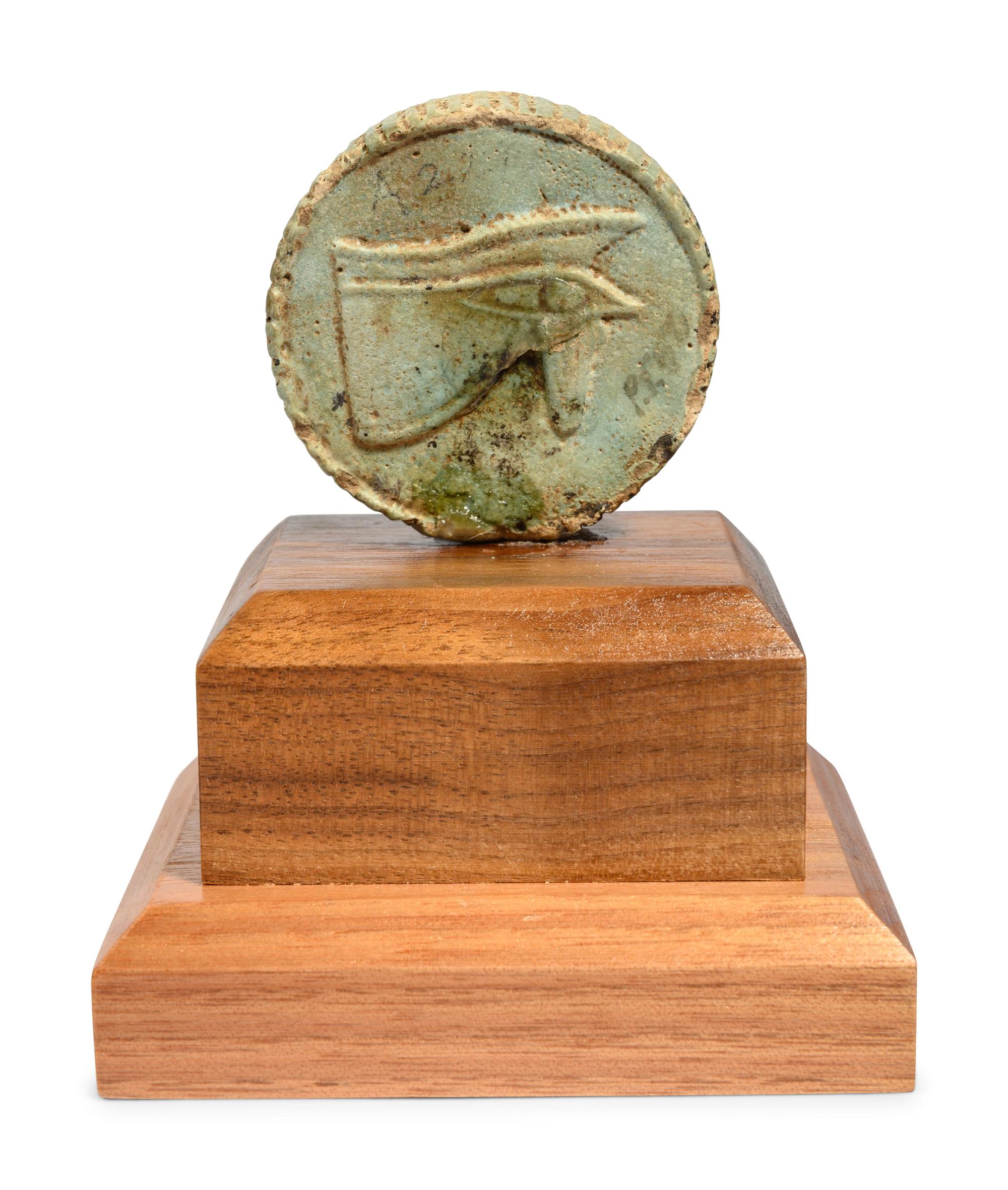 An Egyptian Faience Two-Sided Medallion