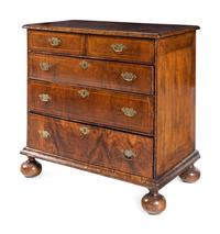 A George II Satinwood-Inlaid Walnut Chest of Drawers