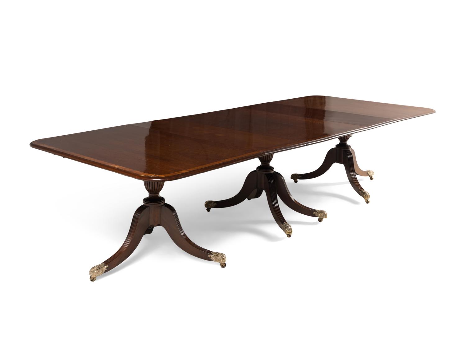 A George III Style Mahogany Triple-Pedestal Dining Table