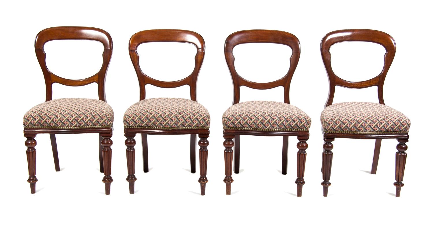 A Set of Four Victorian Walnut Side Chairs Height 34 1/2 inches.