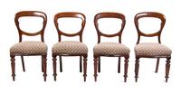 A Set of Four Victorian Walnut Side Chairs Height 34 1/2 inches.
