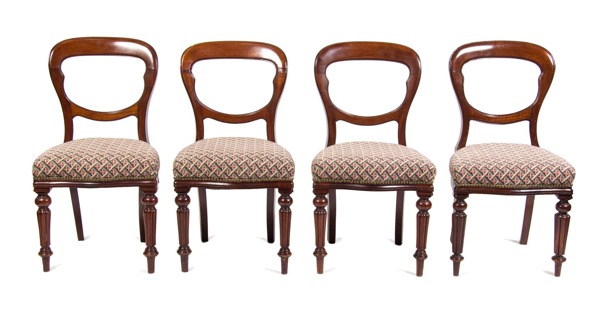 A Set of Four Victorian Walnut Side Chairs Height 34 1/2 inches.