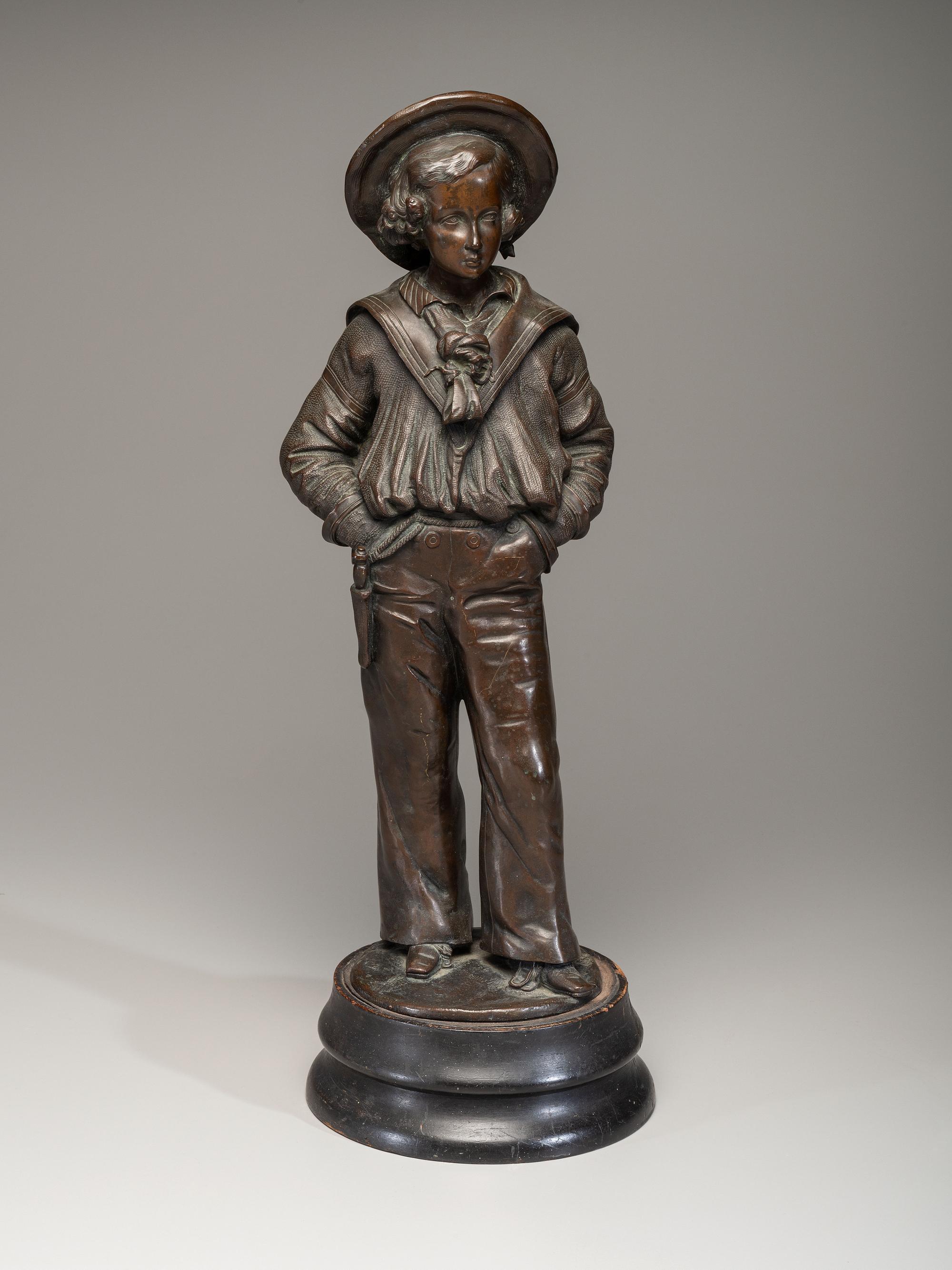 A Cast Bronze Figure of a Sailor Boy