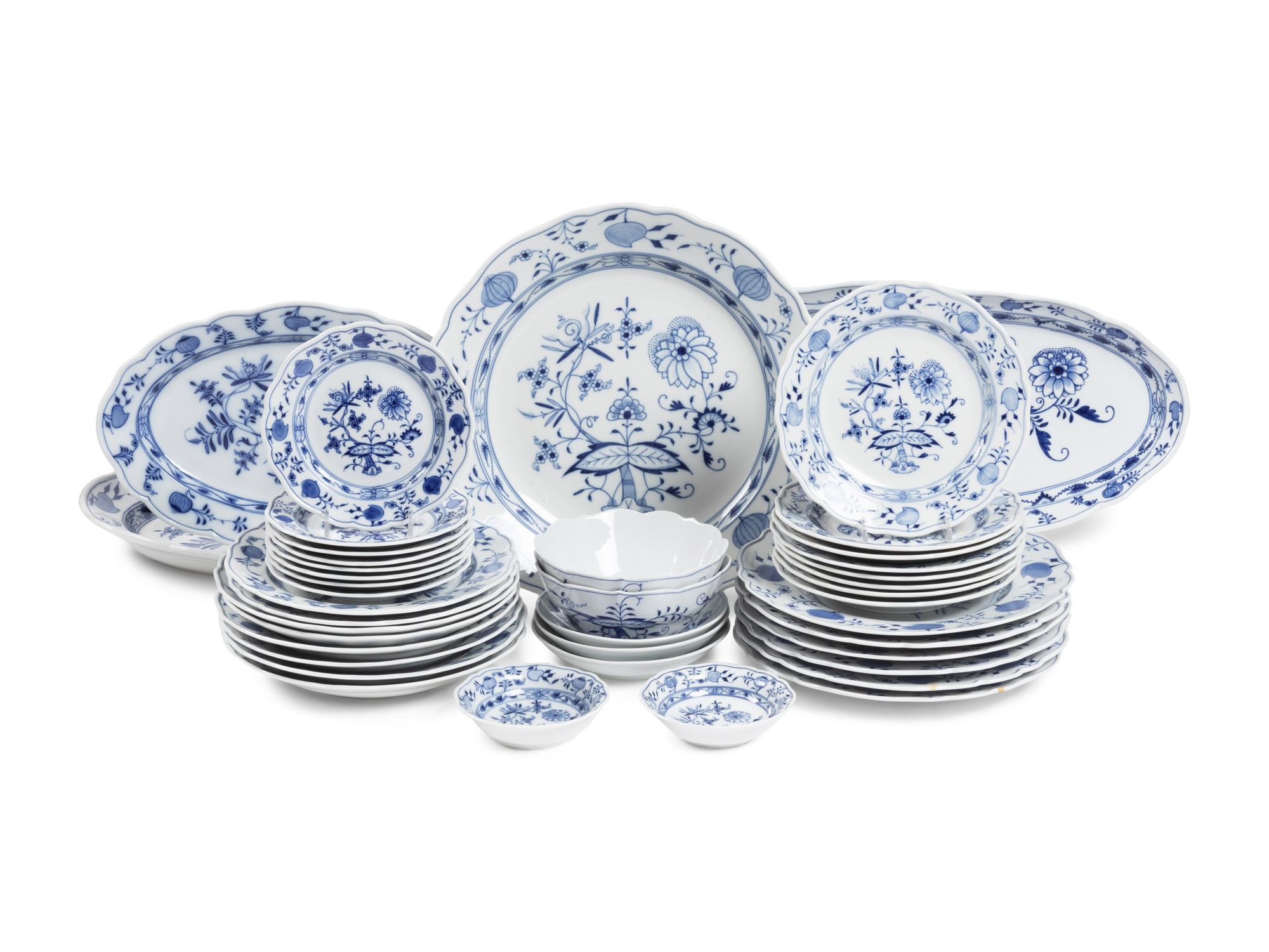An Assembled Meissen Blue Onion Porcelain Dinner Service