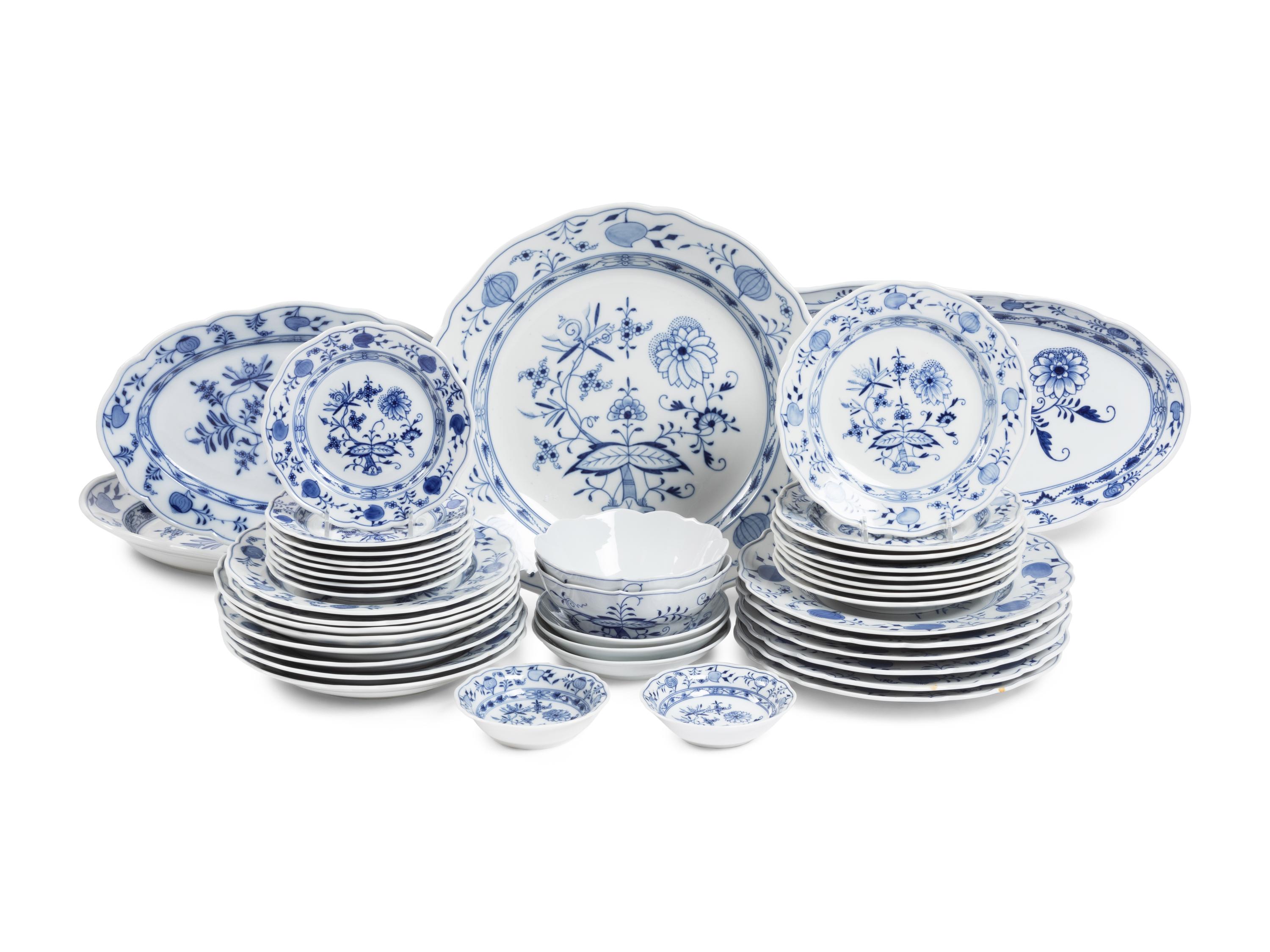 An Assembled Meissen Blue Onion Porcelain Dinner Service