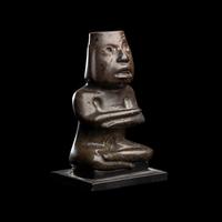 A Group of Twelve Pre-Colombian Style and Near Eastern Style Carved Stone Articles