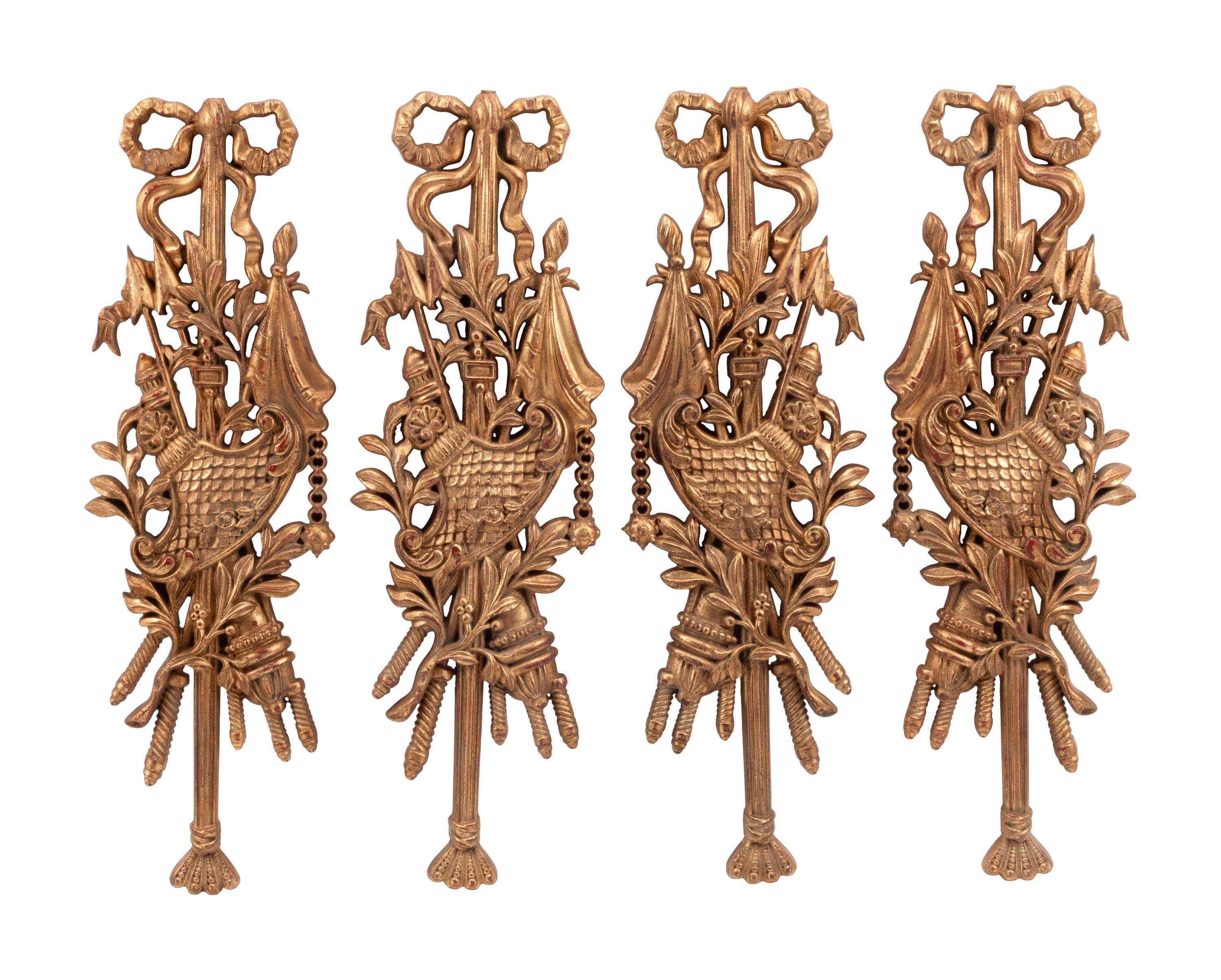 A Set of Four French Carved Giltwood Plaques