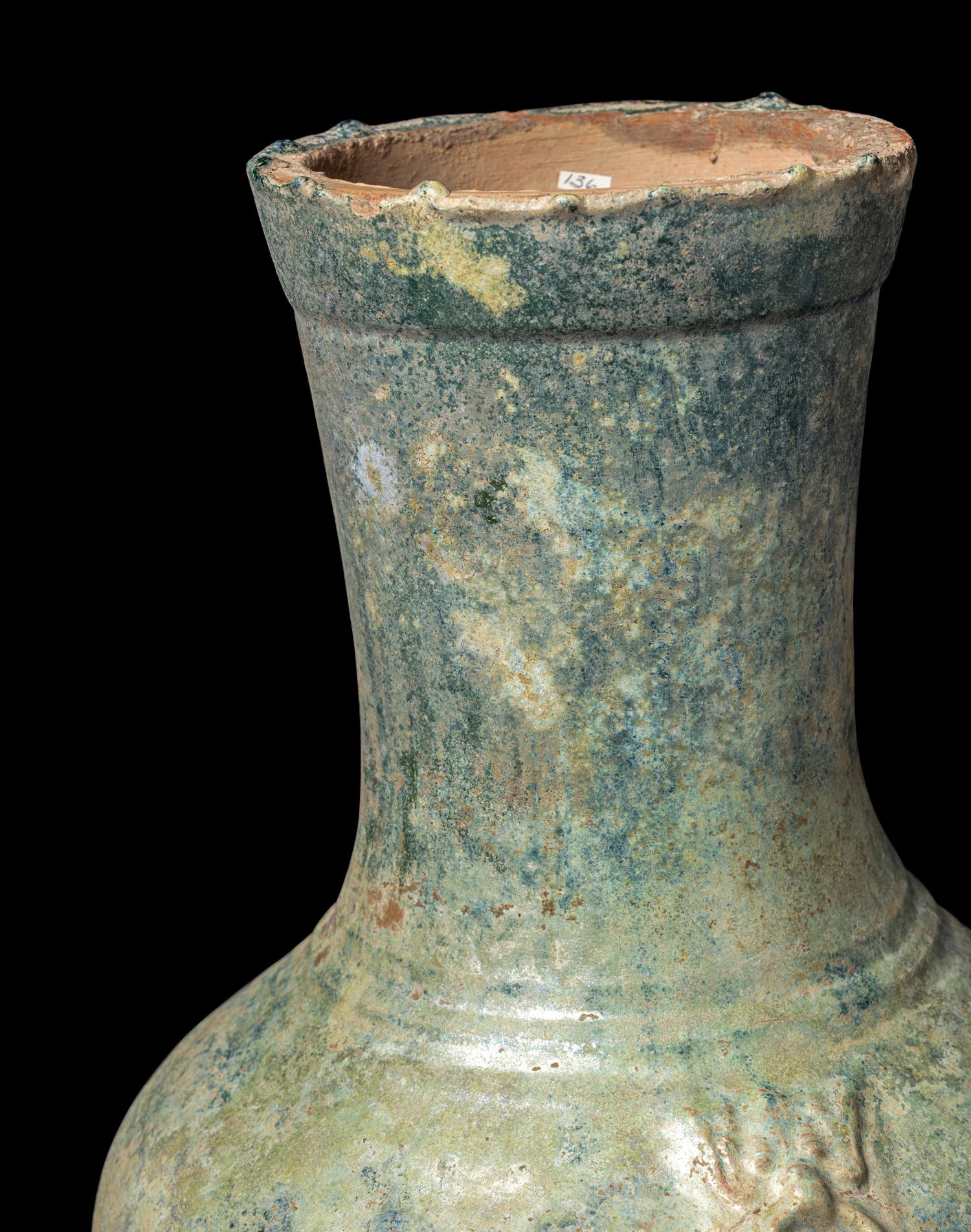 A Chinese Green Glazed Pottery Hu Vase