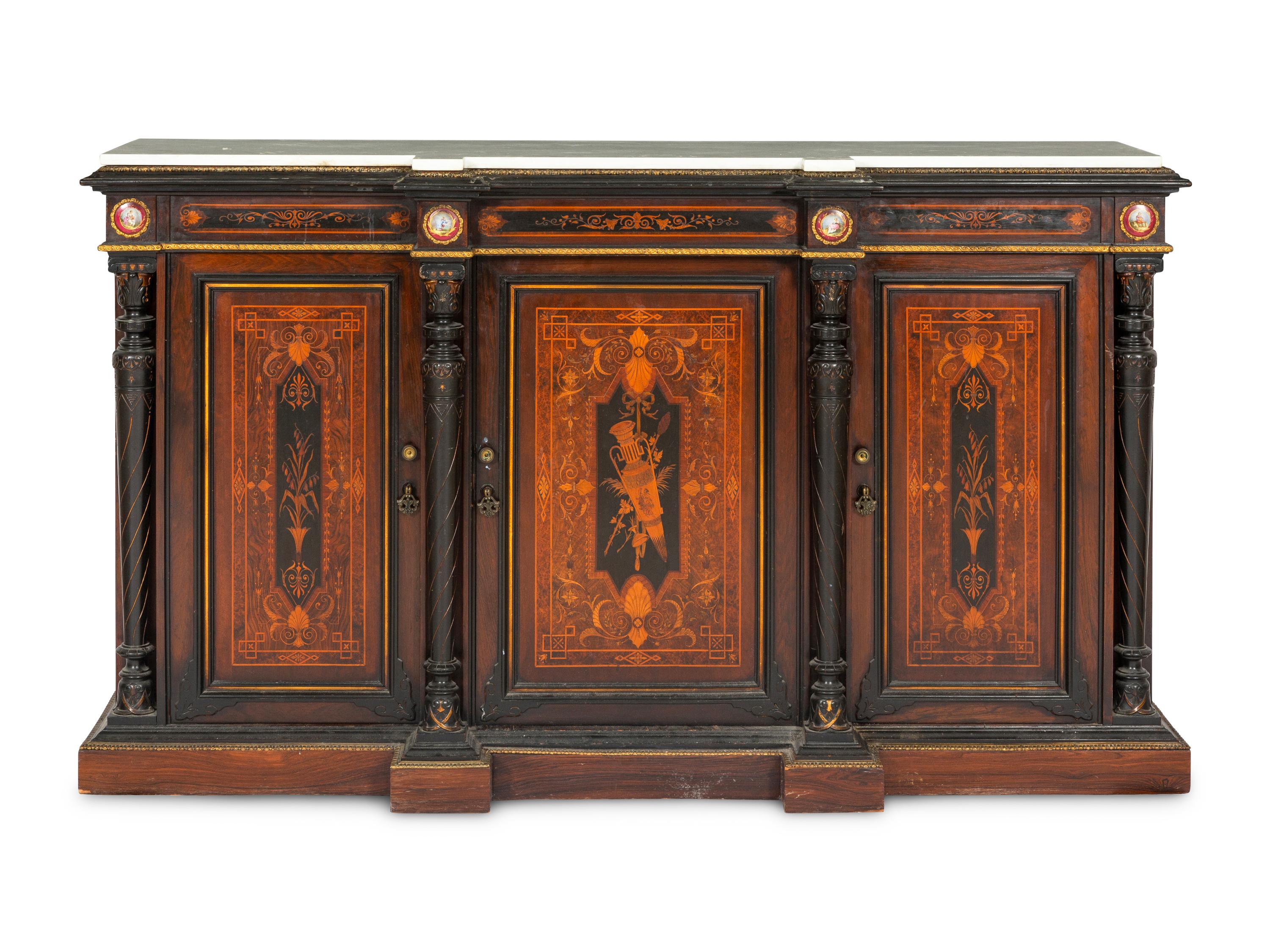 A Victorian Renaissance Revival Marquetry Inlaid and Parcel Ebonized Credenza in the Manner of Herter Brothers