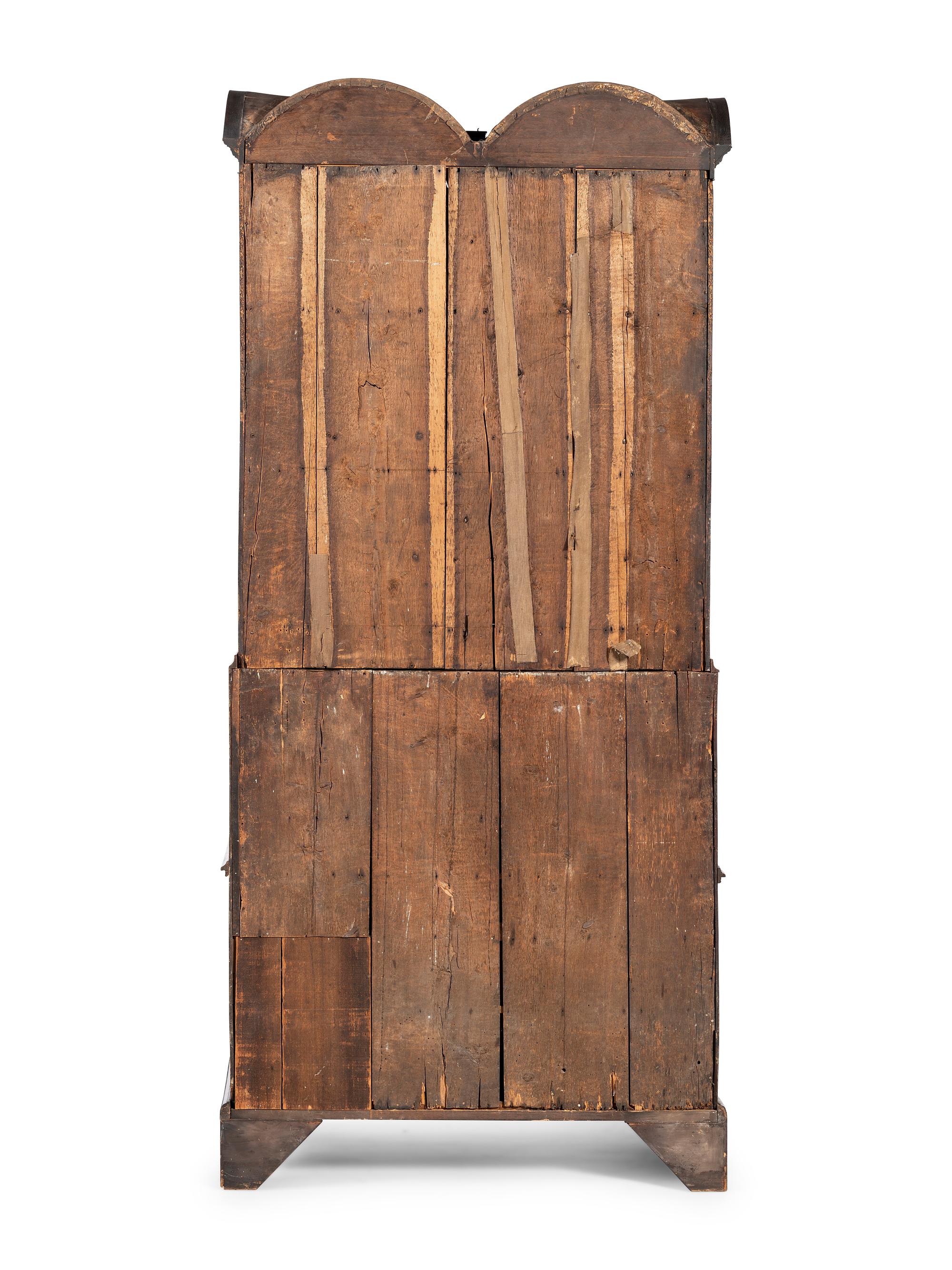 A Queen Anne Walnut Double Bonnet Secretary Bookcase
