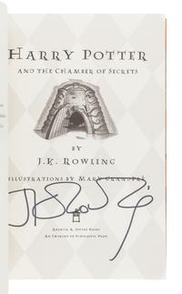 ROWLING, J.K. Harry Potter and the Chamber of Secrets. New York: Scholastic, 2002. Later American edition, with number sequence starting with 60 on copyright page. In a later dust jacket with "Year 2" on the spine, and priced "22.95. SIGNED BY ROWLING on title-page.