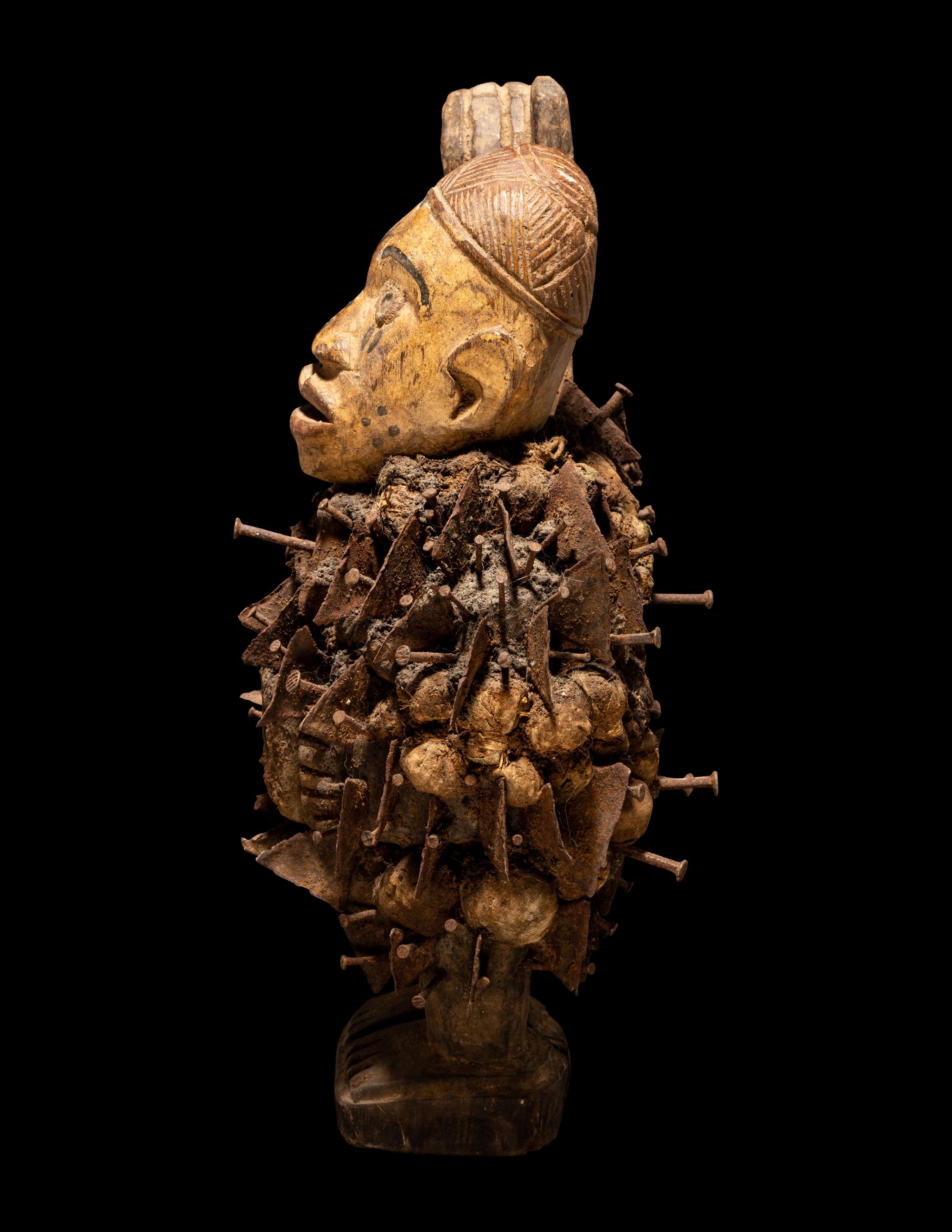 A Yombe or Kongo Oath Making Figure (Nail Fetish)
