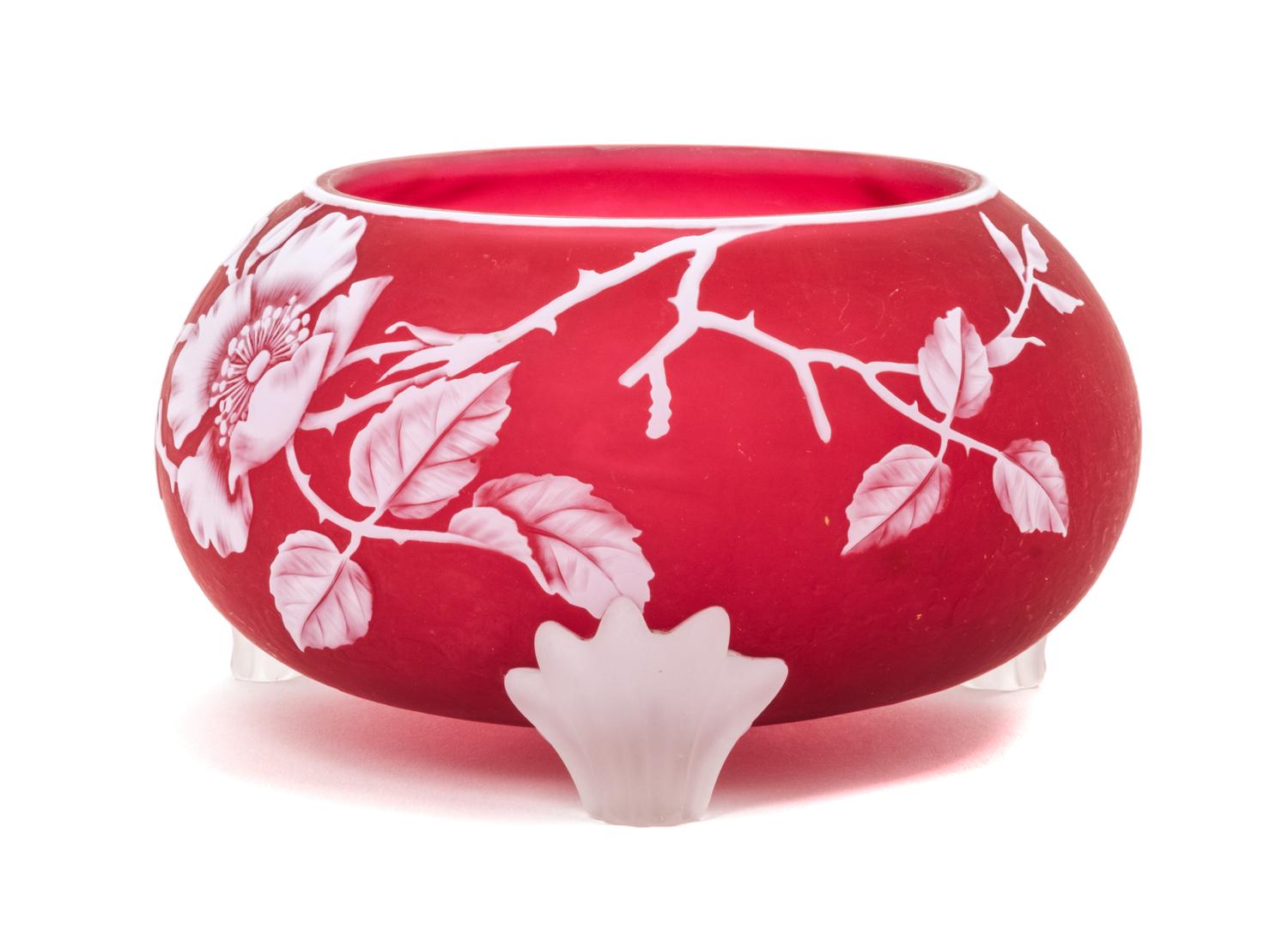 English, LATE 19TH CENTURY, a cameo glass footed bowl, of low form with rose and butterfly decoration, have three applied frosted feet