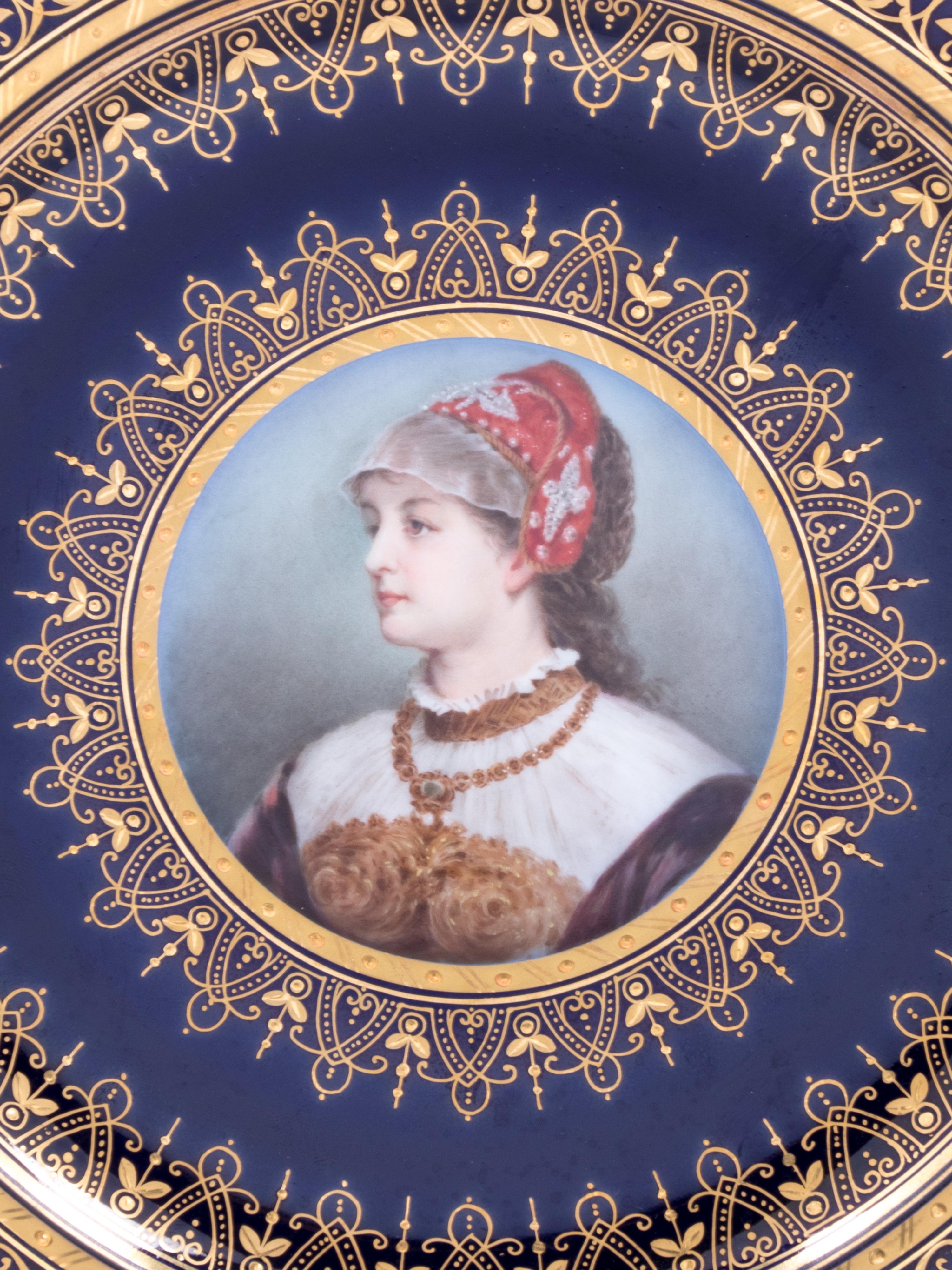 A Vienna Style (Fischer & Mieg) Painted and Parcel Gilt Porcelain Cabinet Plate