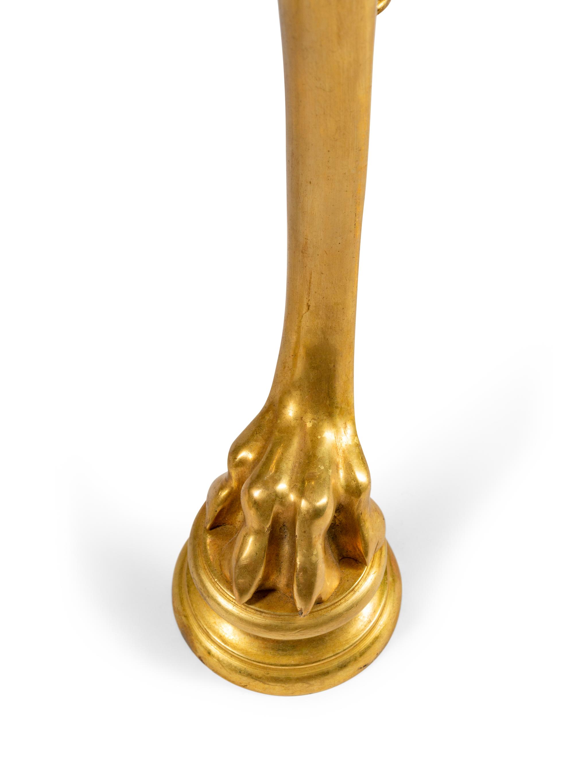 A Pair of Neoclassical Style Parcel-Gilt and Patinated Bronze Guéridons