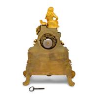 A Louis Philippe Gilt and Patinated Bronze Mantel Clock