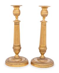 A Pair of Continental Gilt Metal Candlesticks