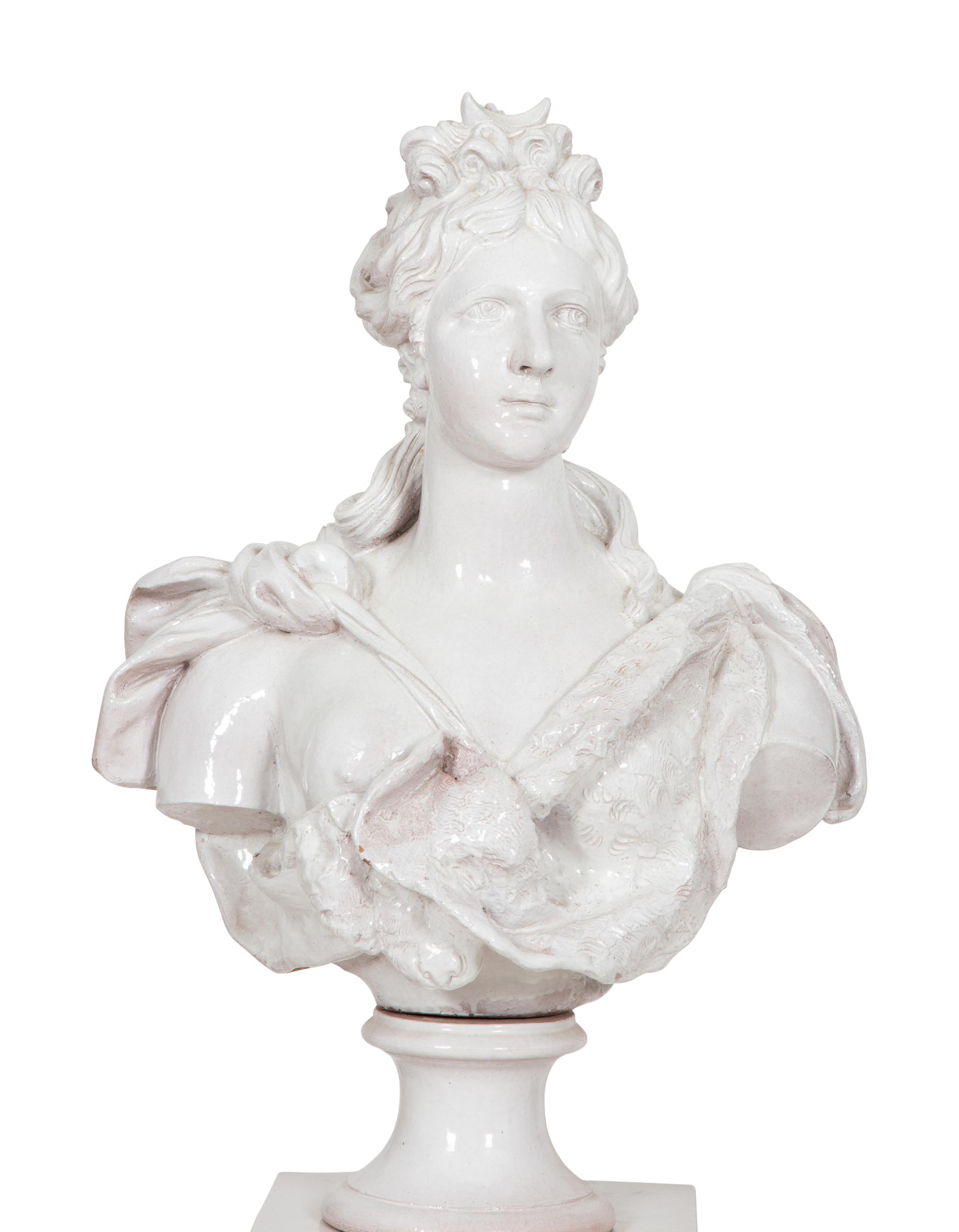 A Pair of Italian Glazed Terracotta Portrait Busts on Neoclassical Style Pedestals