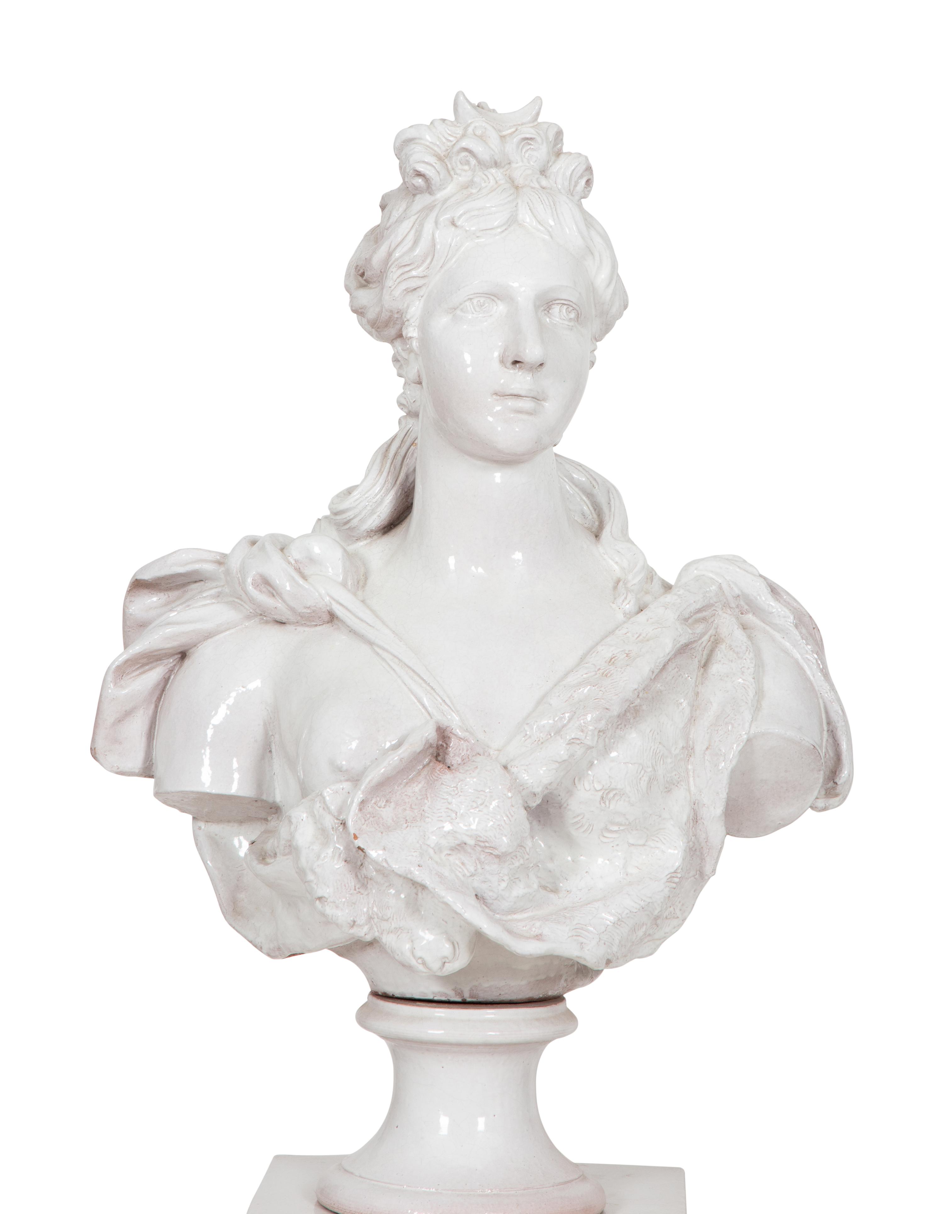 A Pair of Italian Glazed Terracotta Portrait Busts on Neoclassical Style Pedestals
