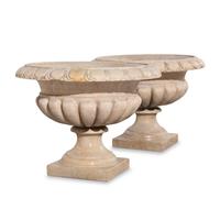 A Pair of Neoclassical Style Carved Marble Urns