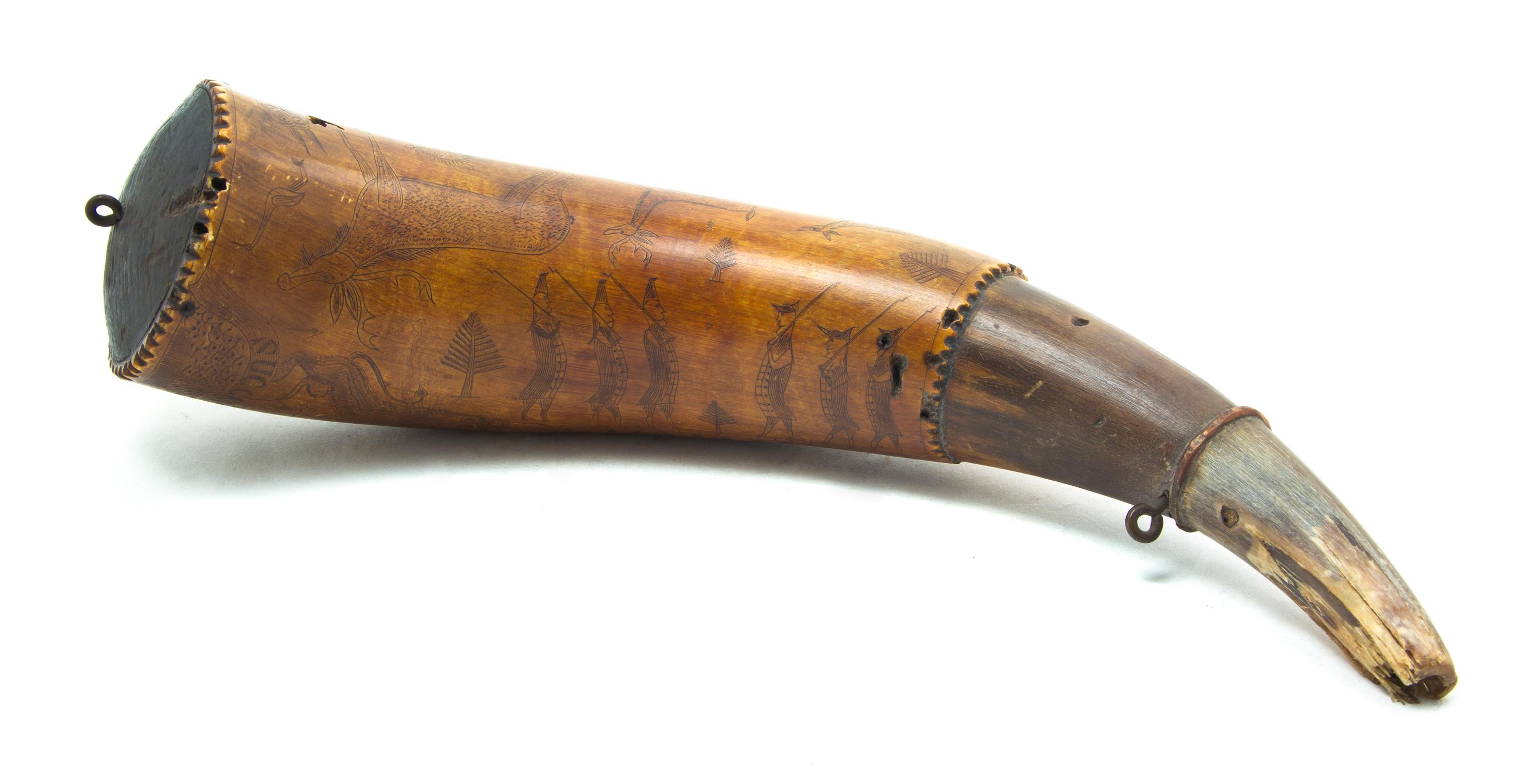 A Revolutionary War Era Carved Powder Horn, Length 12 1/4 inches.