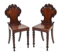 A Pair of Victorian Mahogany Hall Chairs, Height 34 1/4 inches.