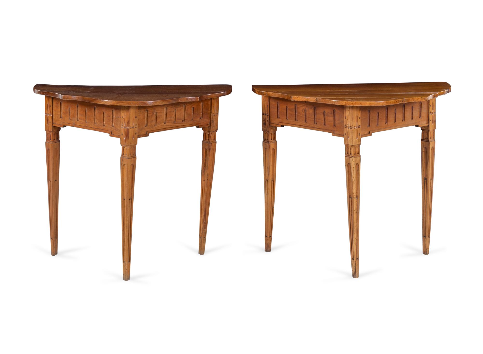 A Pair of Continental Carved Fruitwood Console Tables