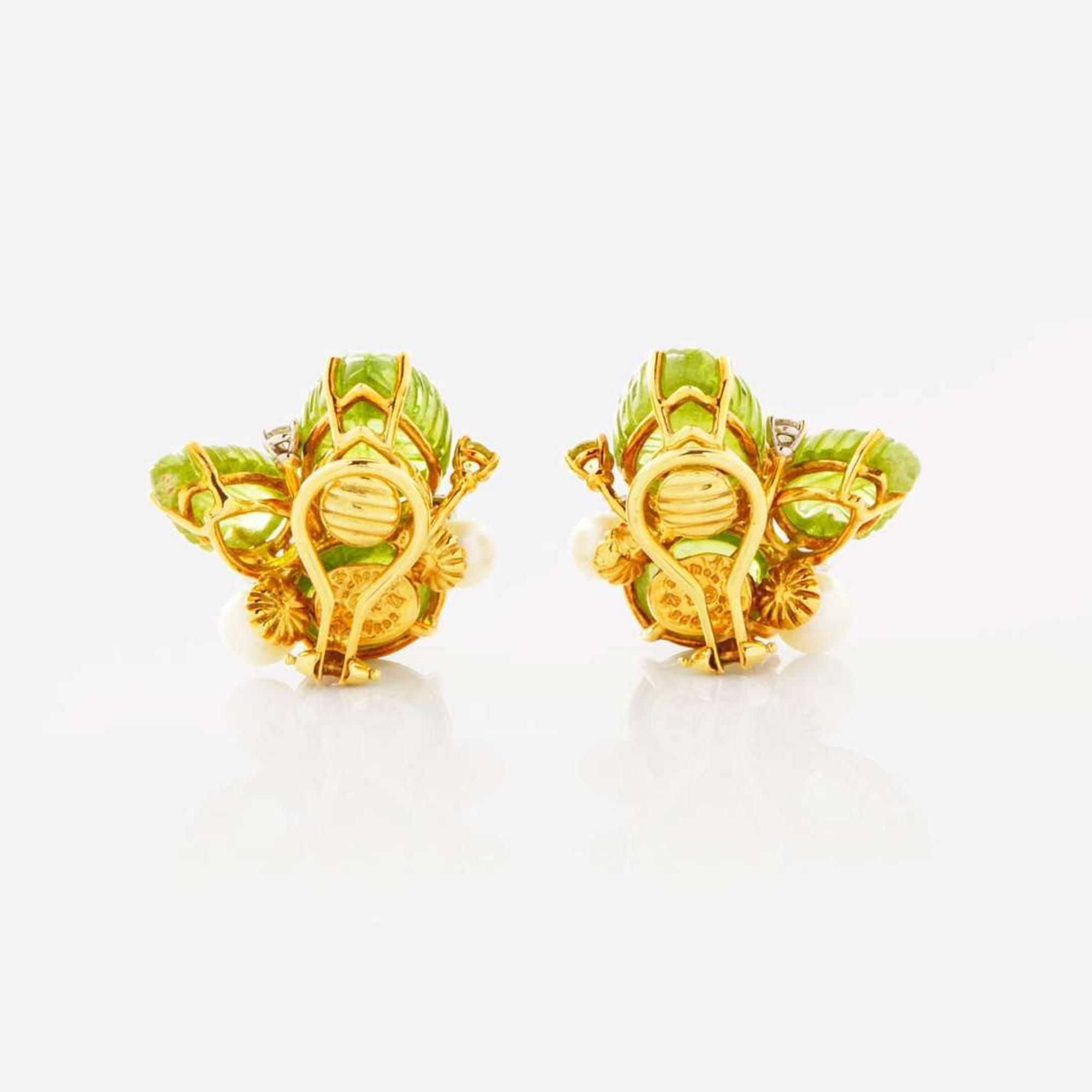 A Pair of 18K Yellow Gold Seaman Schepps Peridot Ear Clips