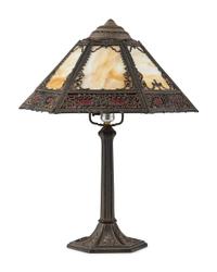 A Cast Iron and Slag Glass Table Lamp