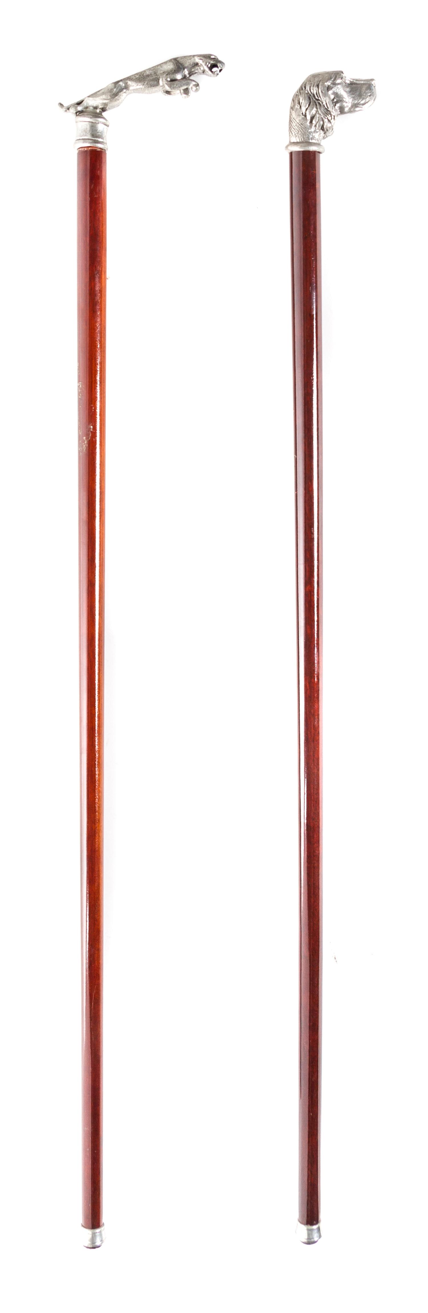 Two Silvered Metal Cane Heads, Length of handle 5 x length of longer 34 inches.