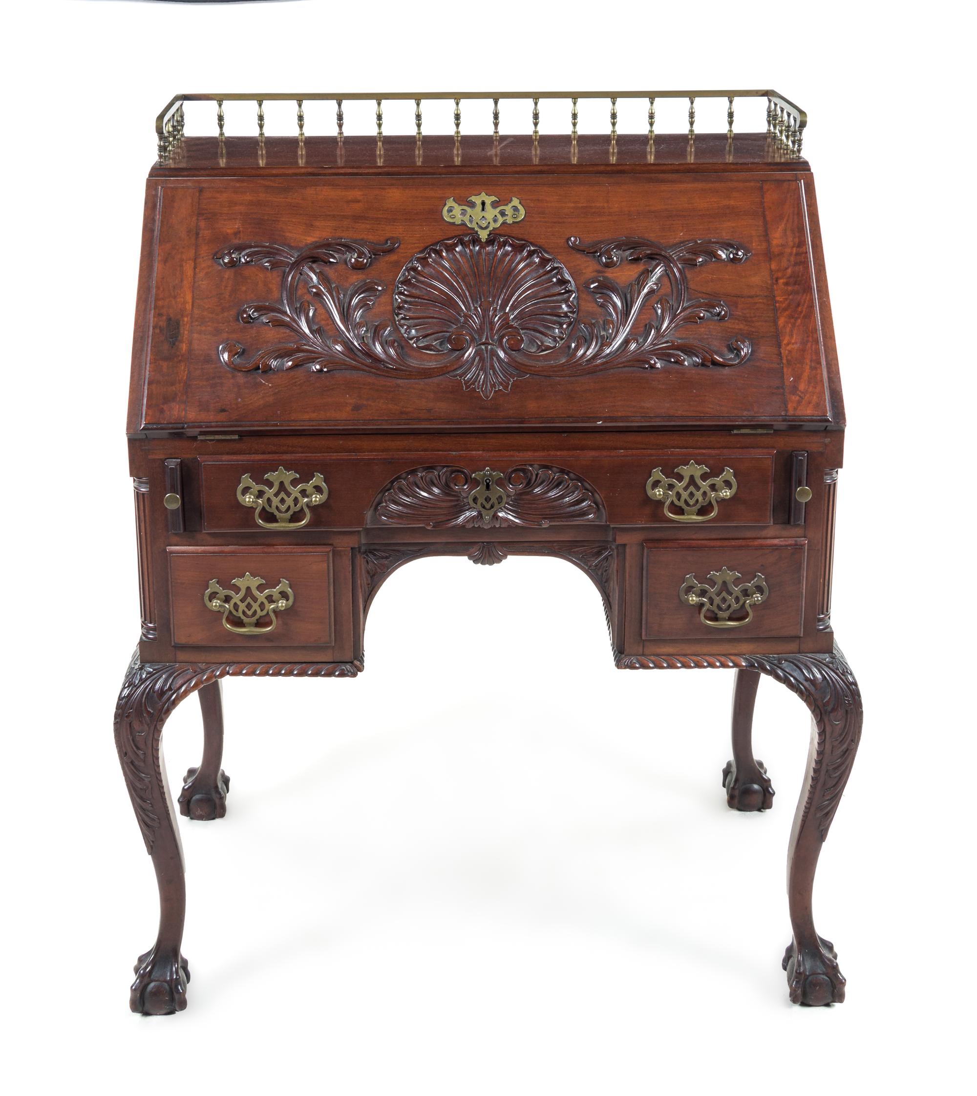 A Chippendale Style Mahogany Slant-Front Desk Height 42 x width 34 1/4 x depth 20 inches. — 19TH/20TH CENTURY