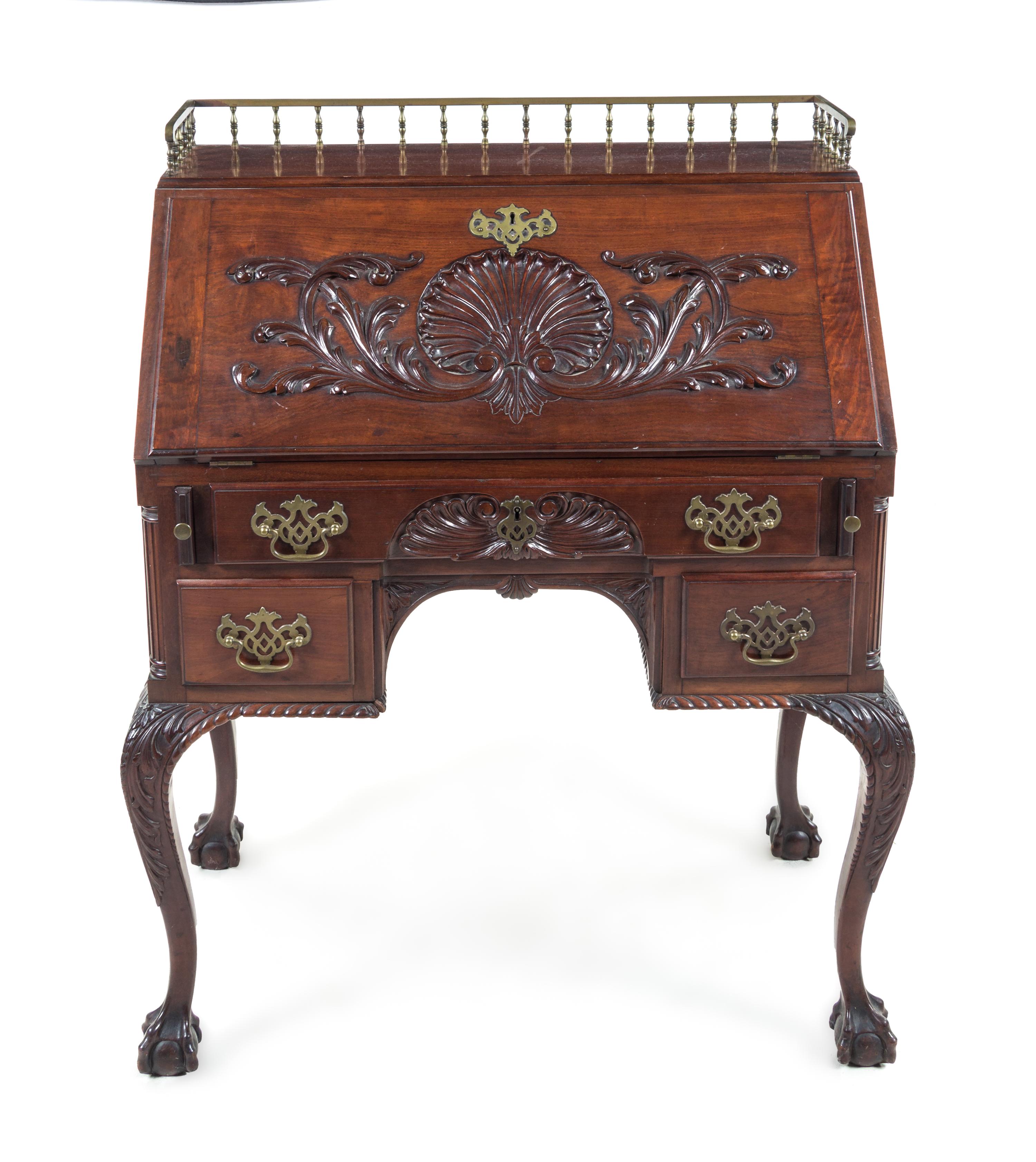 A Chippendale Style Mahogany Slant-Front Desk Height 42 x width 34 1/4 x depth 20 inches. — 19TH/20TH CENTURY