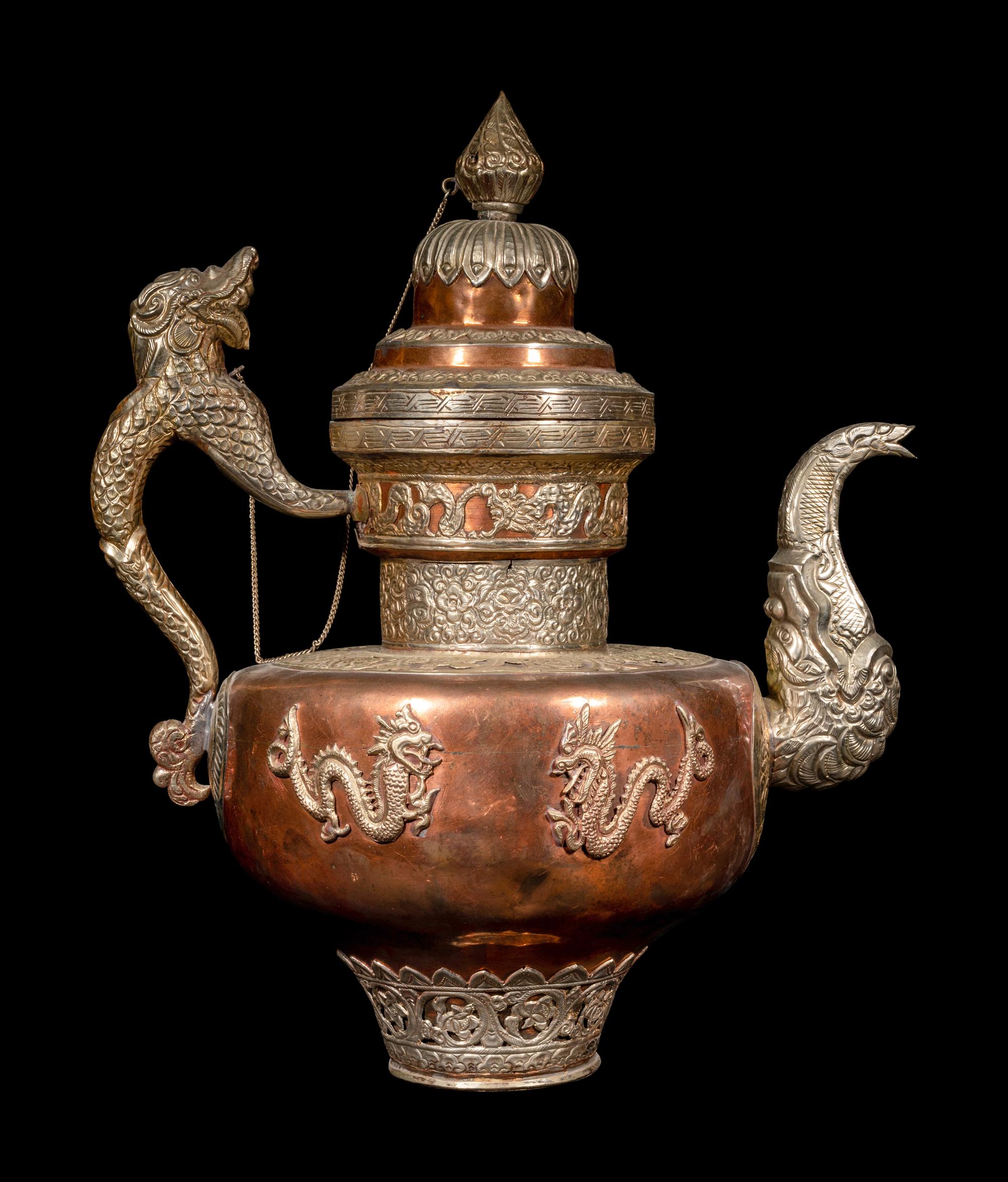 A Tibetan Silver and Copper Covered Ewer and A Chinese Bronze Pitcher