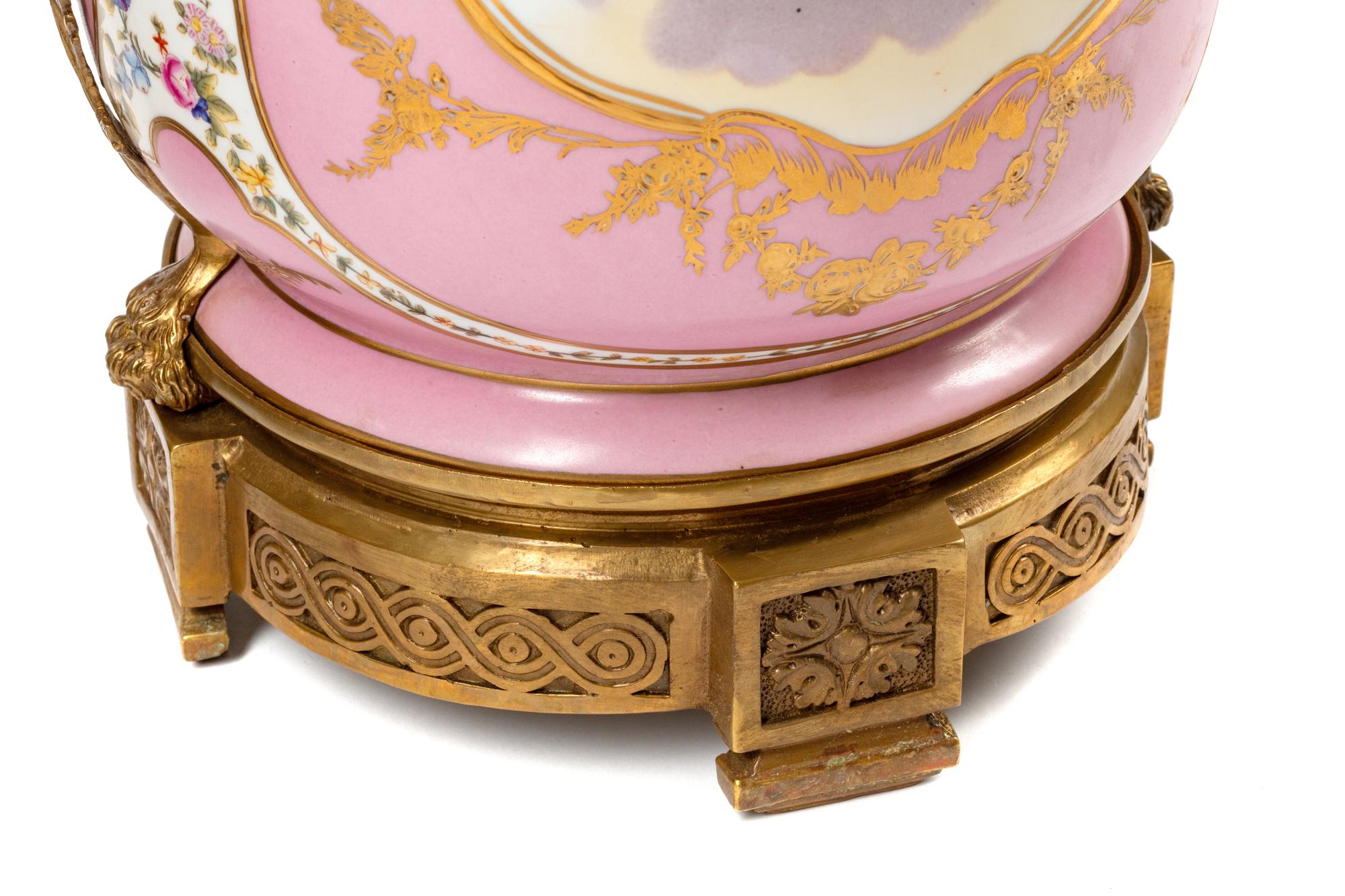 A Pair of Sèvres Style Gilt Bronze Mounted Porcelain Cache Pots