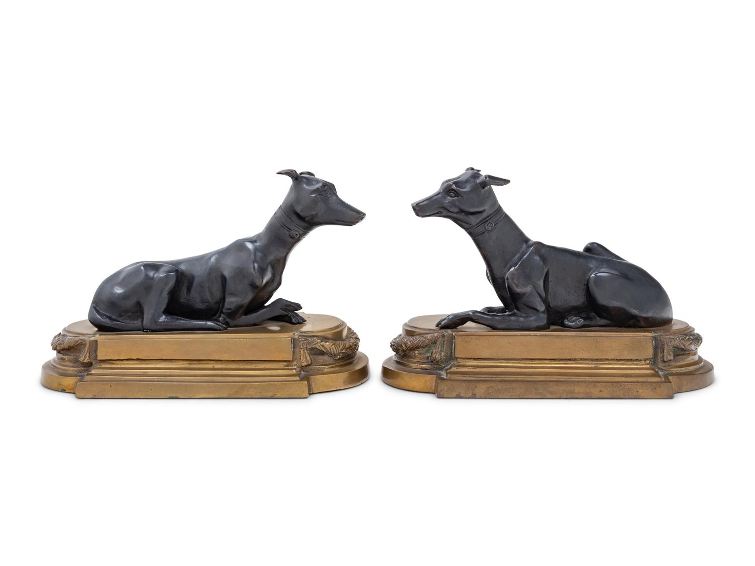 A Pair of Gilt and Patinated Bronze Figures of Whippets