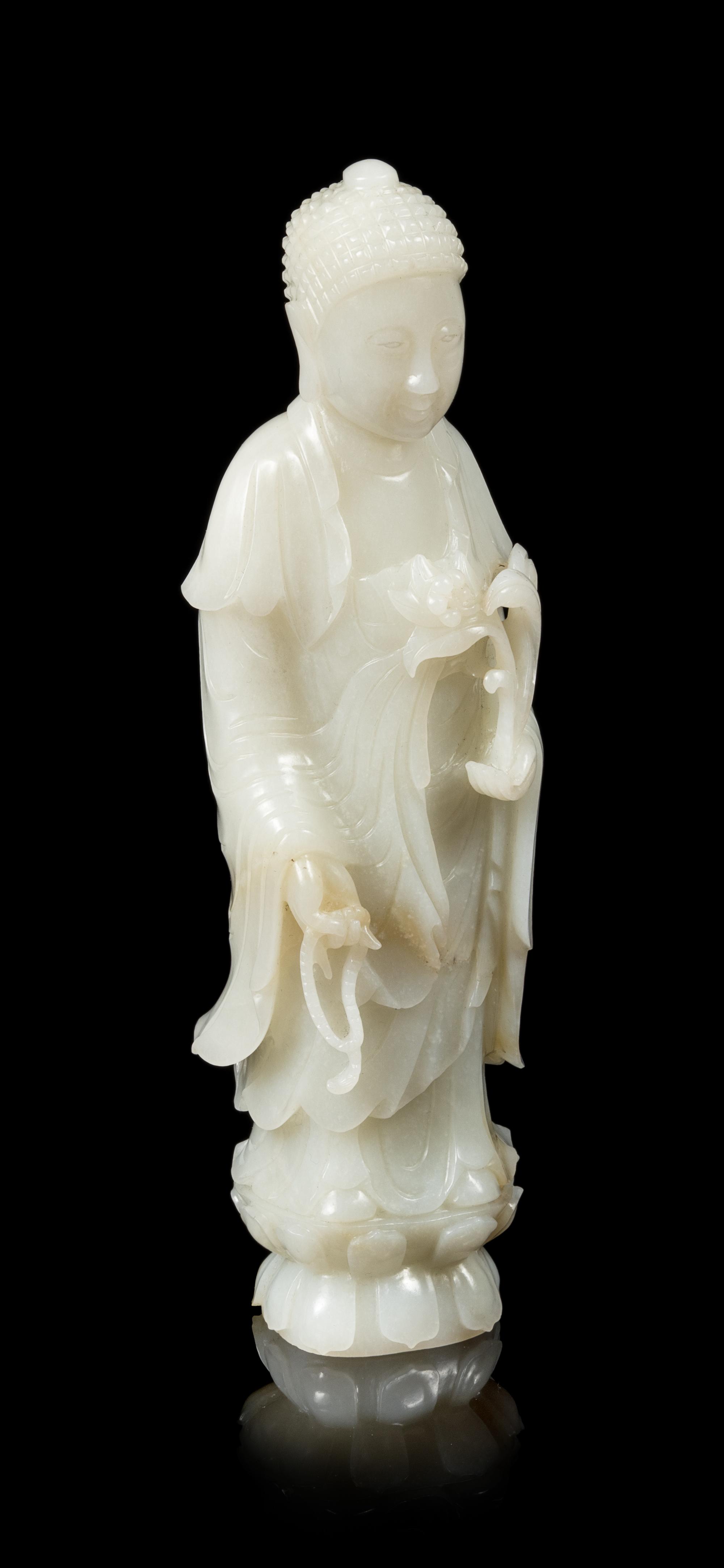 A White Jade Figure of Buddha Height 7 5/8 inches. — LATE 19TH CENTURY
