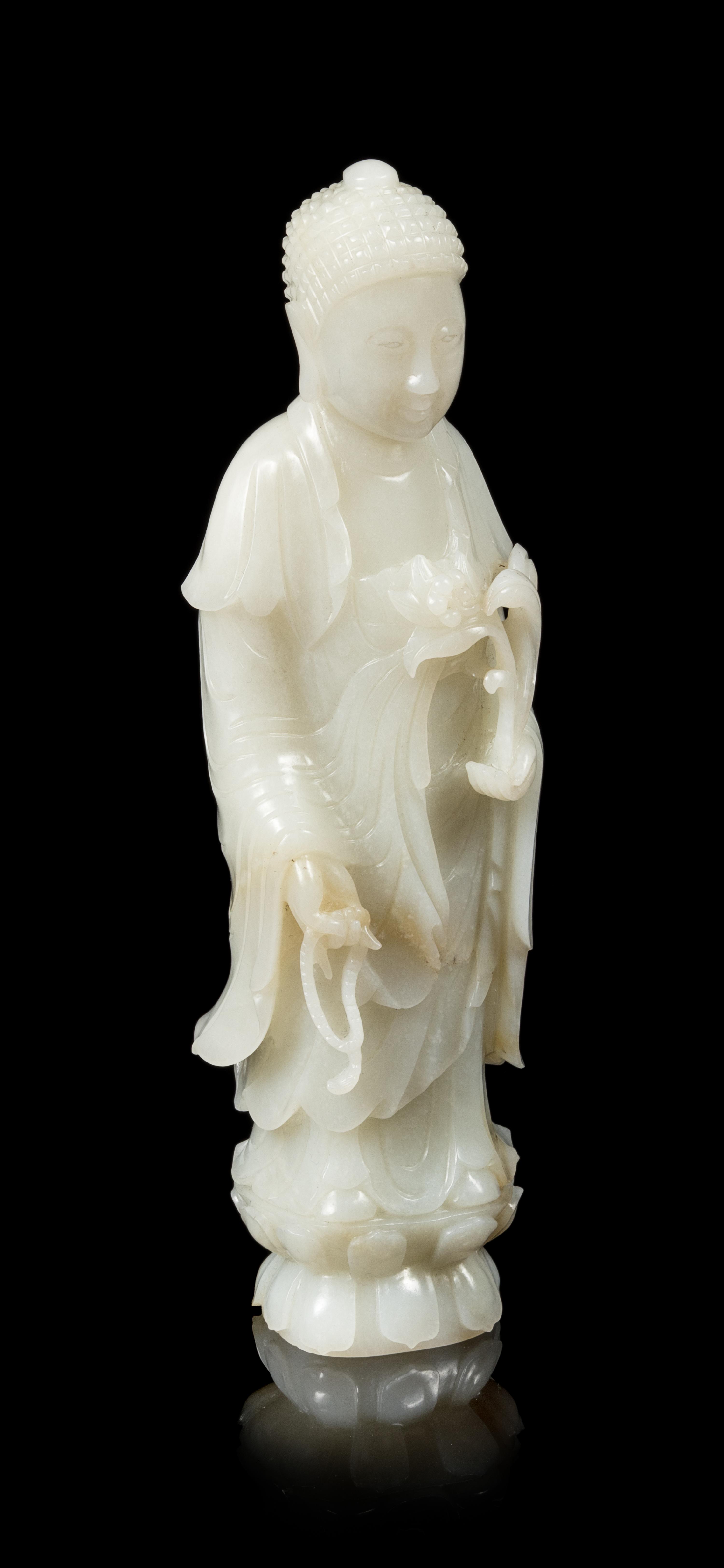 A White Jade Figure of Buddha Height 7 5/8 inches. — LATE 19TH CENTURY