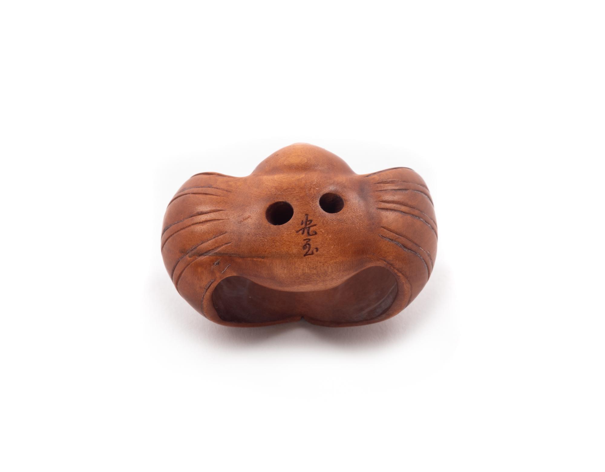 A Japanese Carved Boxwood Netsuke