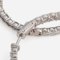 A Pair of Diamond and 14K White Gold Earrings