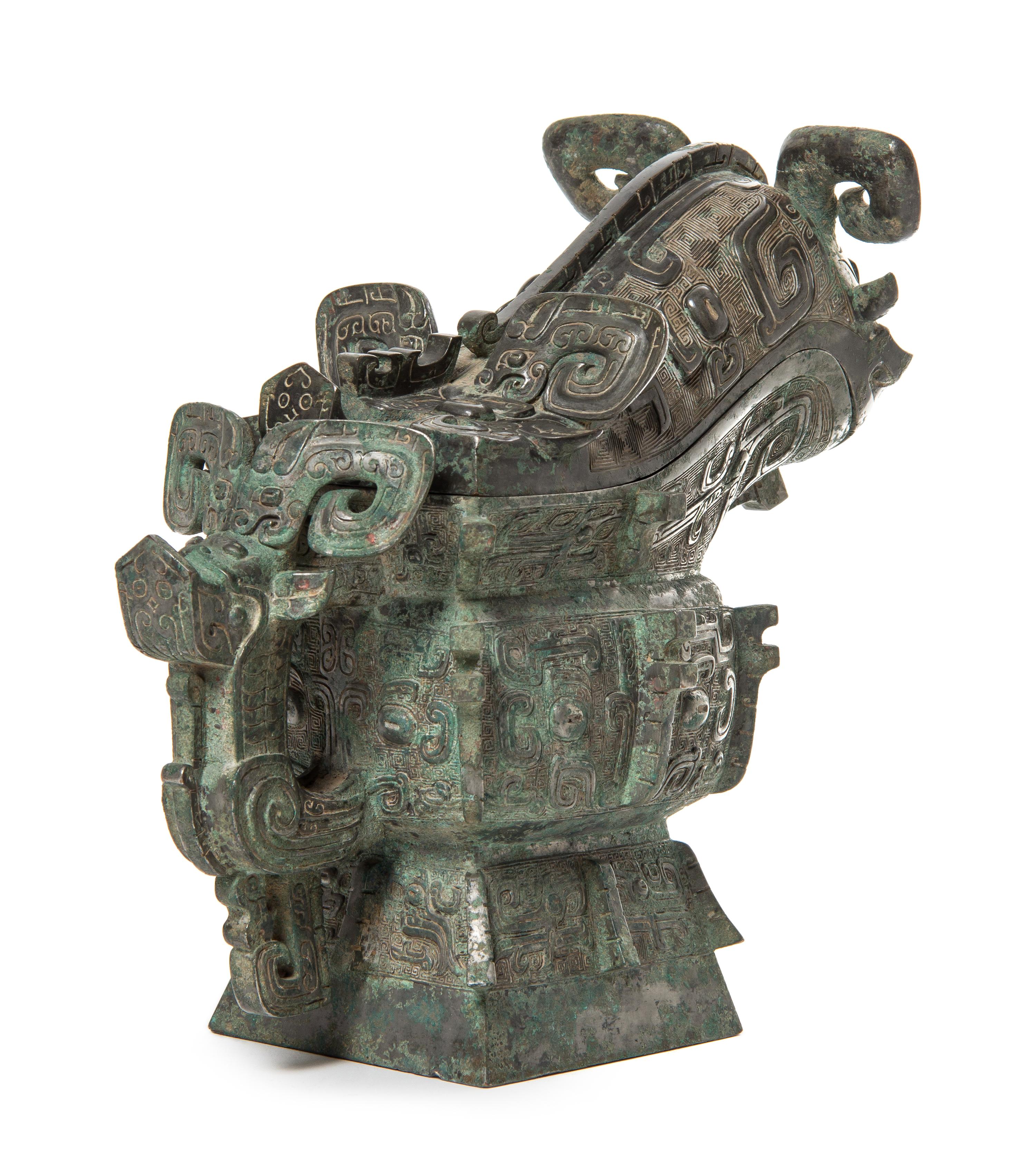 A Bronze Ritual Gong Vessel Height 12 5/8 inches.